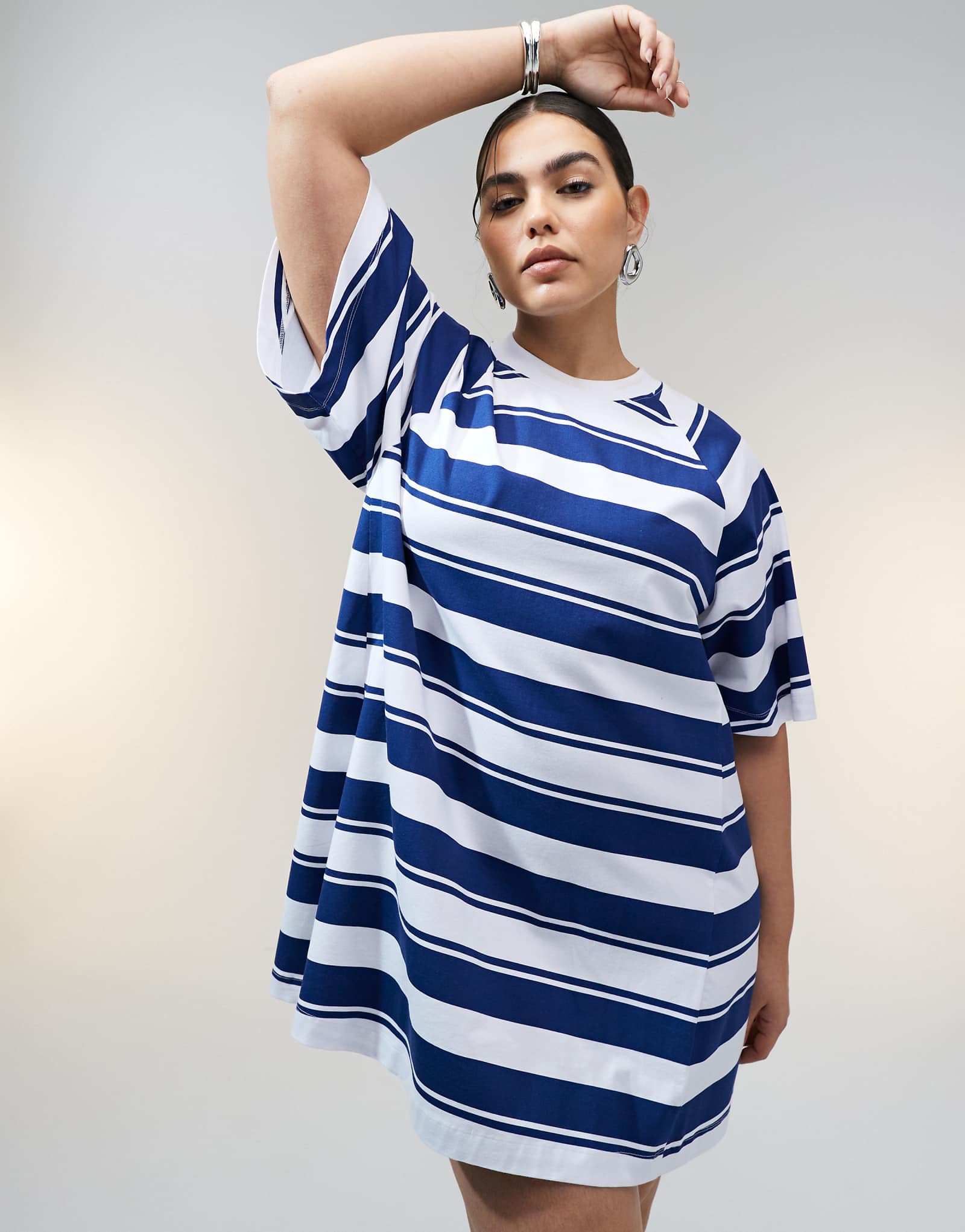 ASOS DESIGN Curve t-shirt swing mini dress in blue stripe
