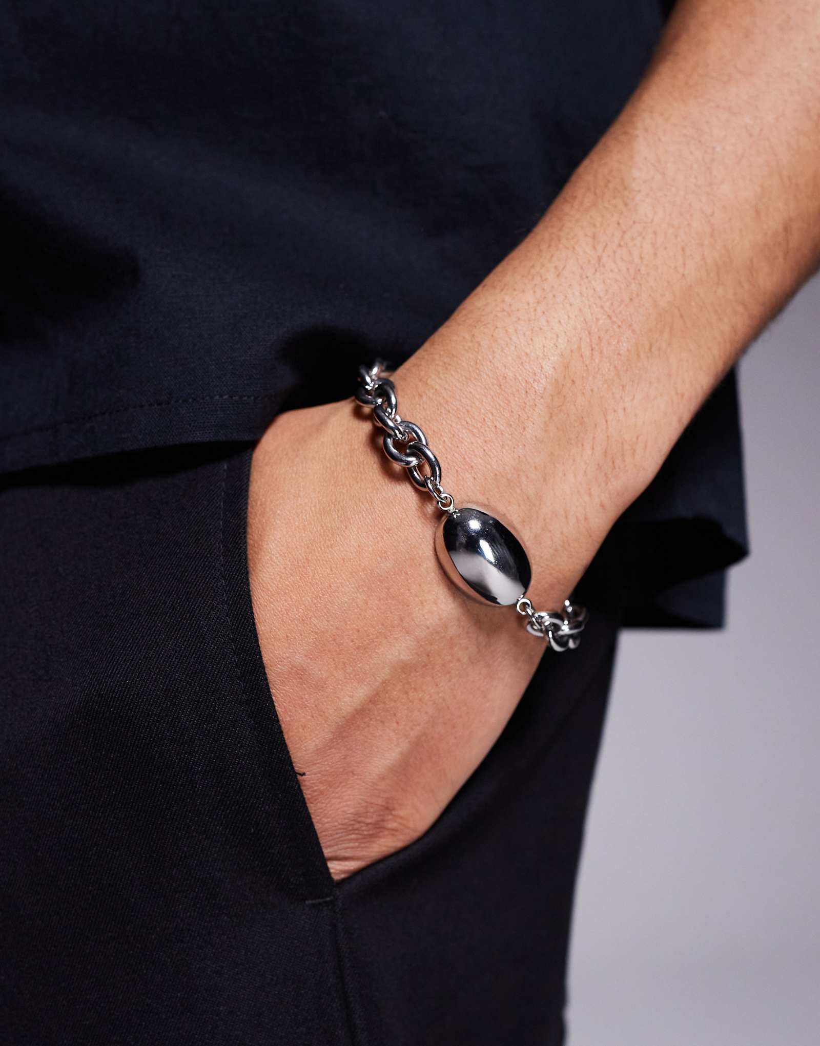 ASOS DESIGN waterproof stainless steel oversized bracelet with oval pendant in silver tone 3090₽