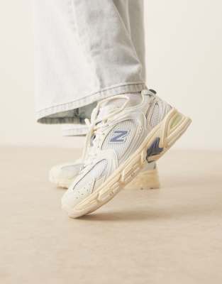 Женские кроссовки New Balance 530 с белыми и синими деталями
