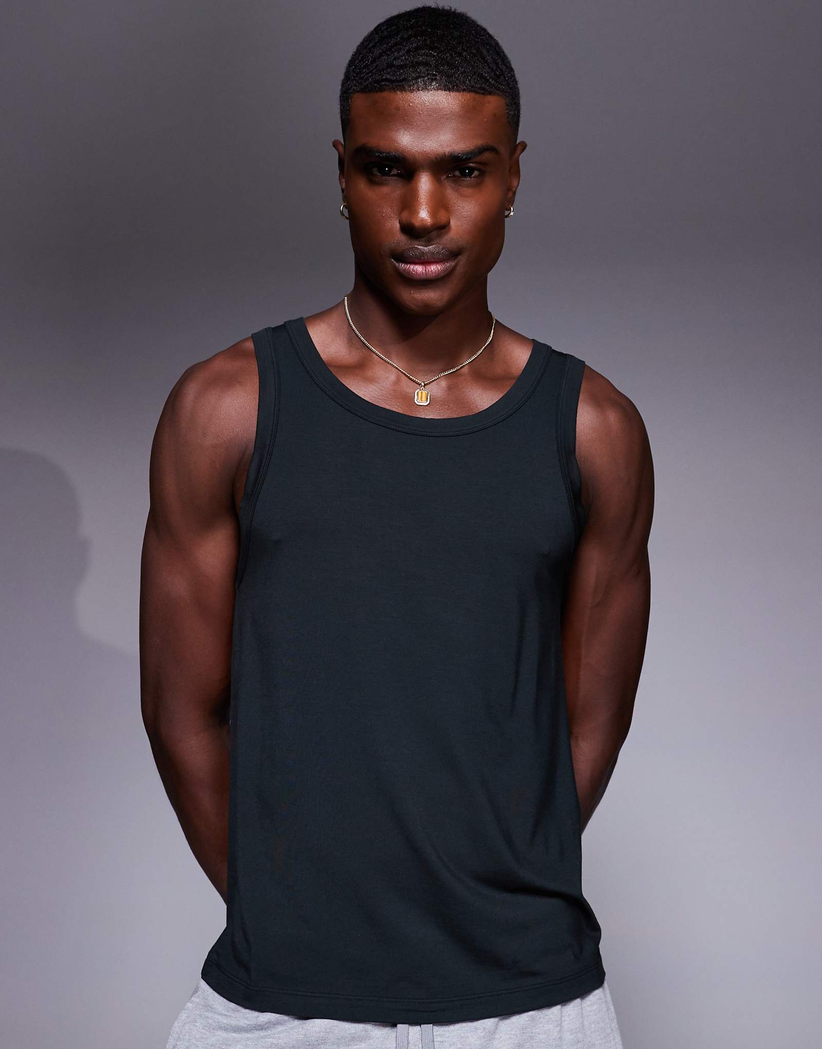 CHÉ Studios body tank top in black