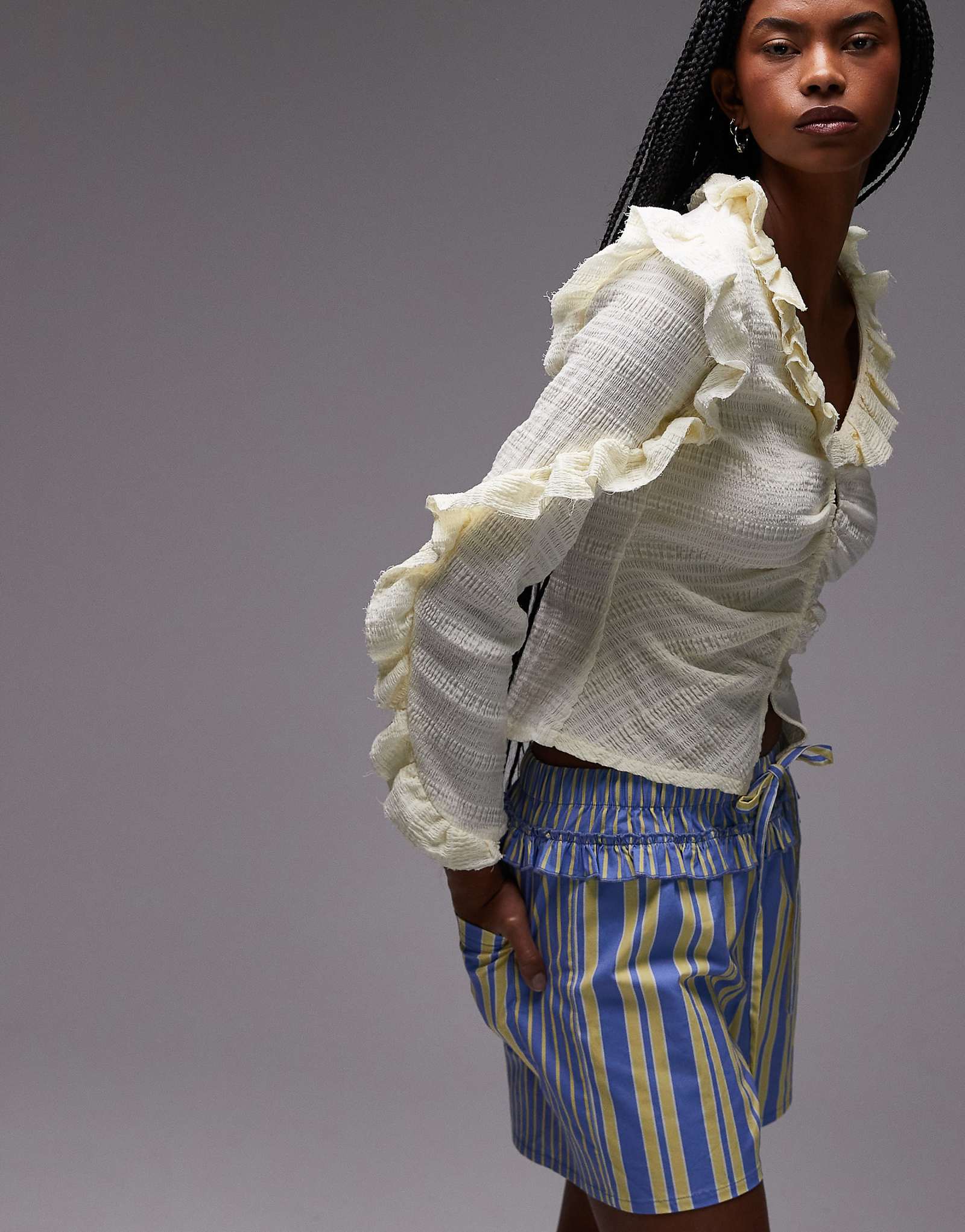 LAAGAM textured ruffle front button up blouse in white 16990₽