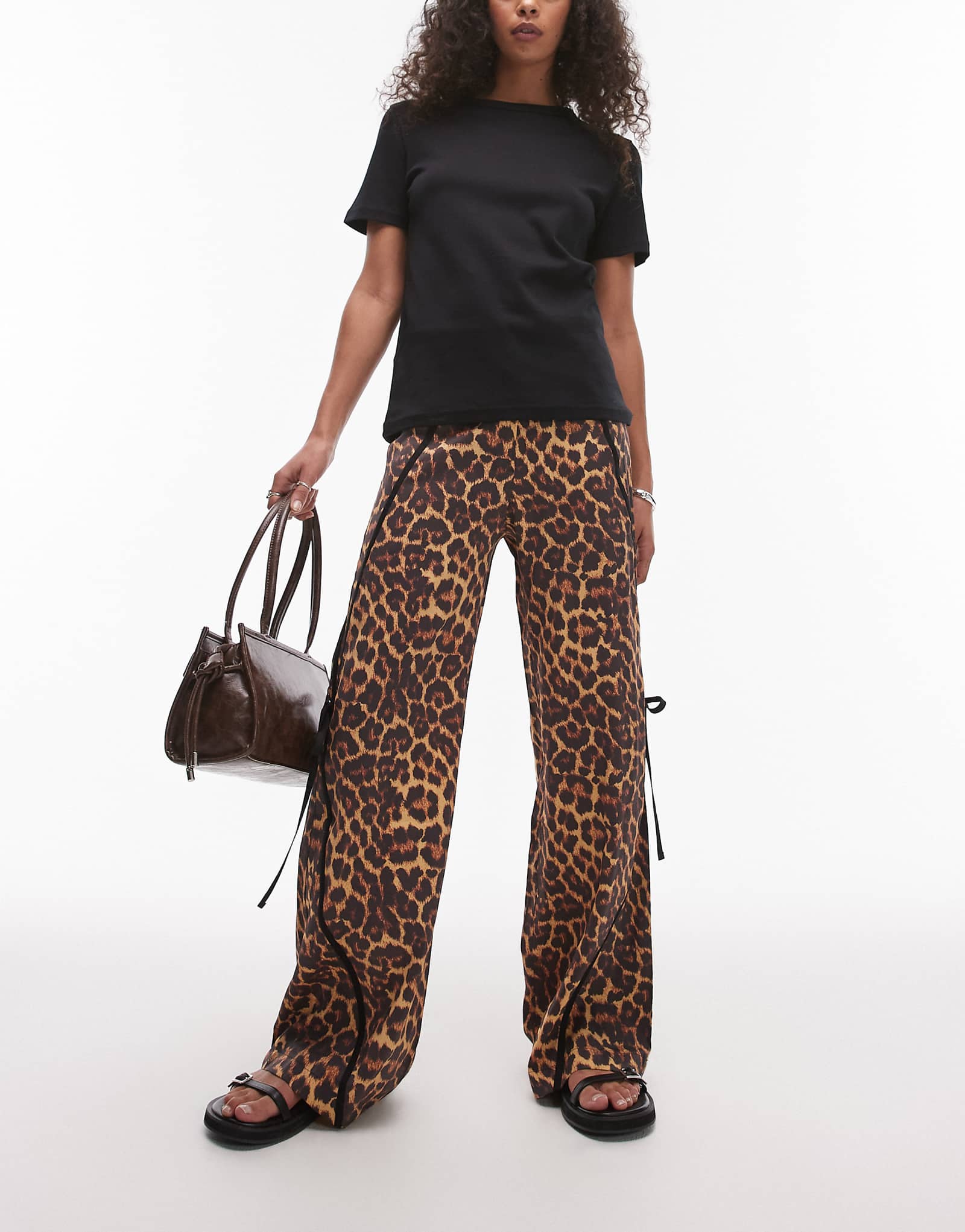 LAAGAM vicky leopard print mid rise tracksuit pants with bow detail