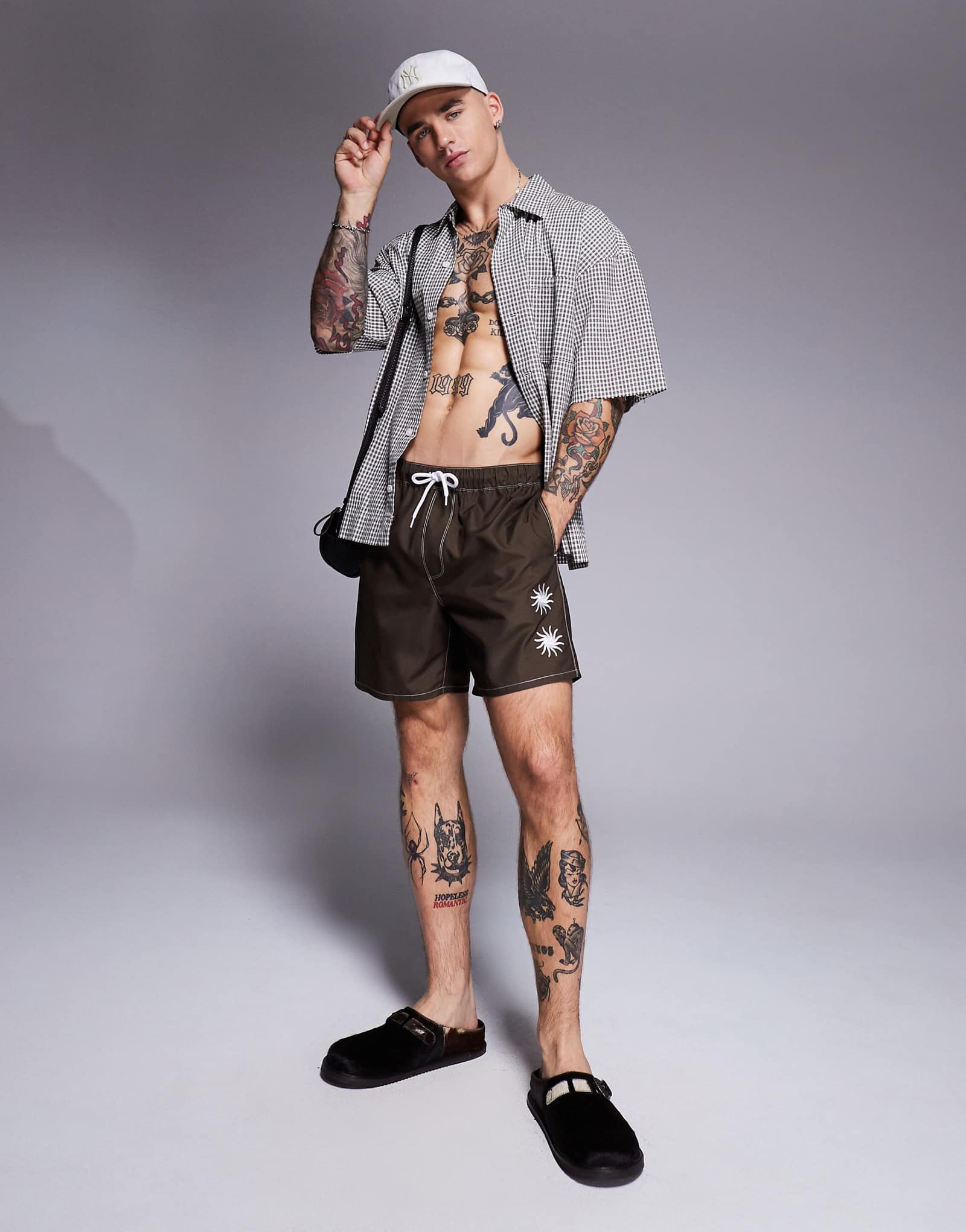 ASOS DESIGN swim shorts in mid length with sun embroidery in brown 3490₽