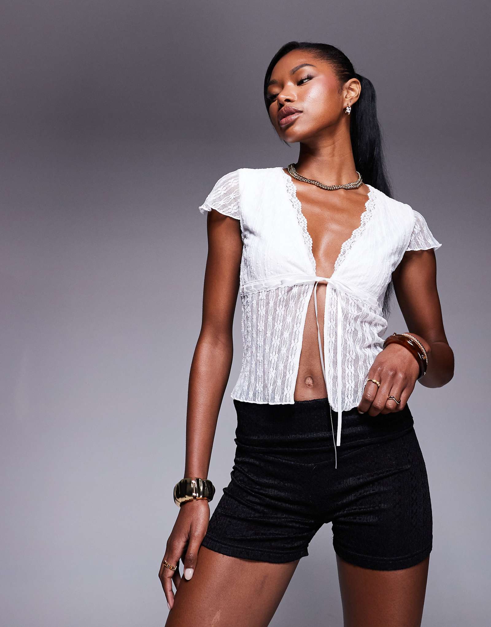 Princess Polly fold over lace mini shorts in black 4690₽