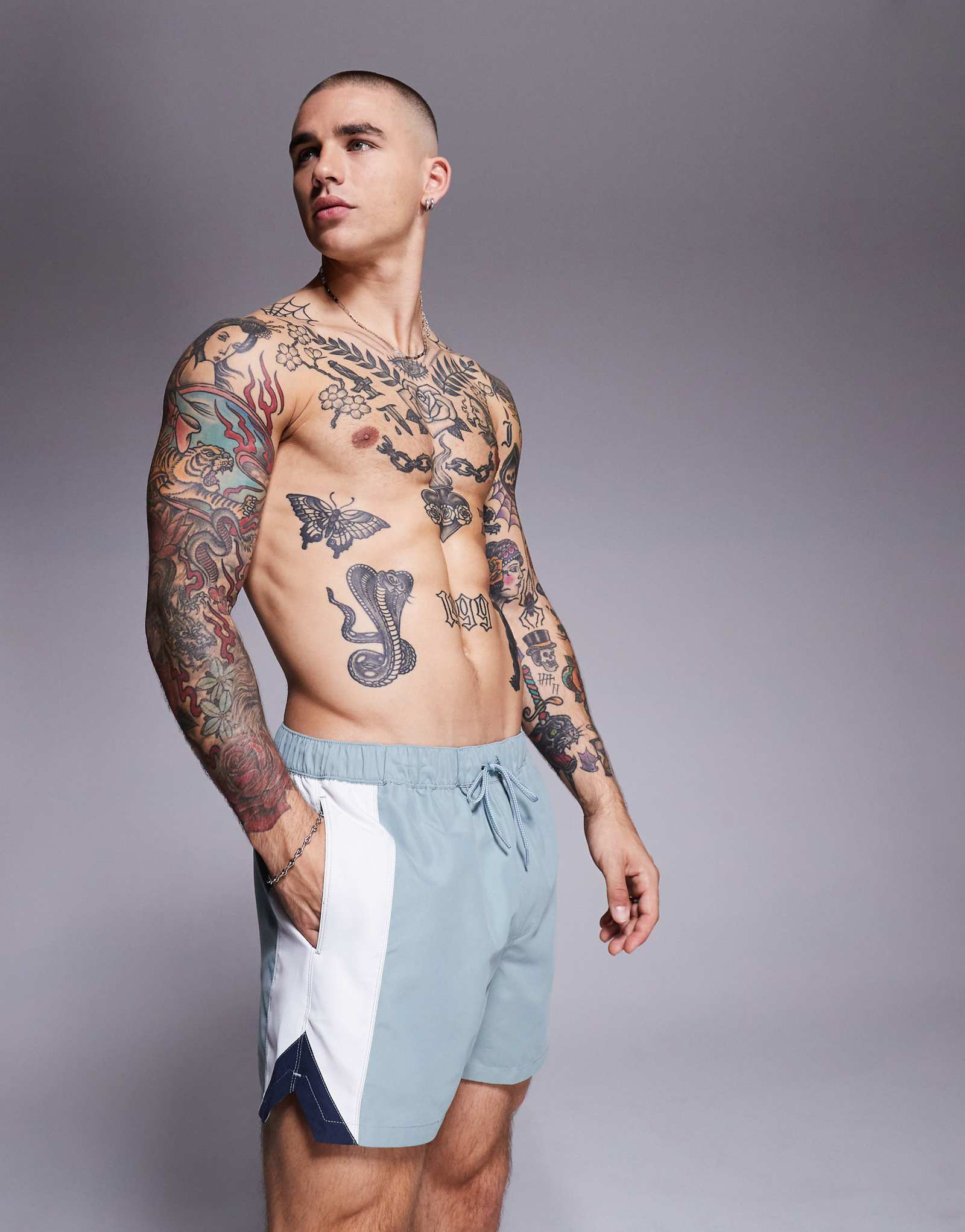 ASOS DESIGN swim shorts in short length with side vent cut and sew in blue 4090₽