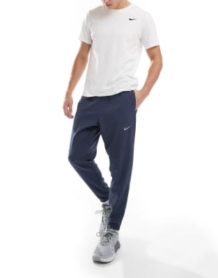 Спортивные брюки Nike Running Challenger из ткани темно-синего цвета