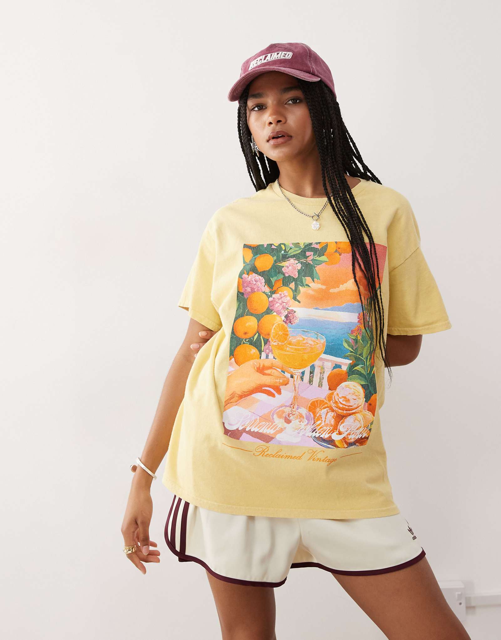 Reclaimed Vintage oversized vacation print t-shirt in washed yellow