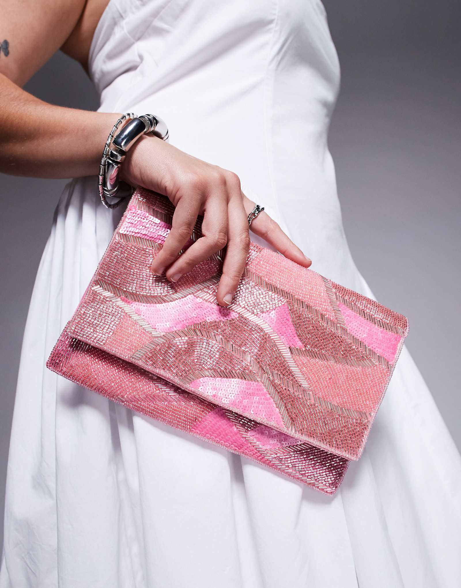 True Decadence sequin pattern envelope clutch bag in pink