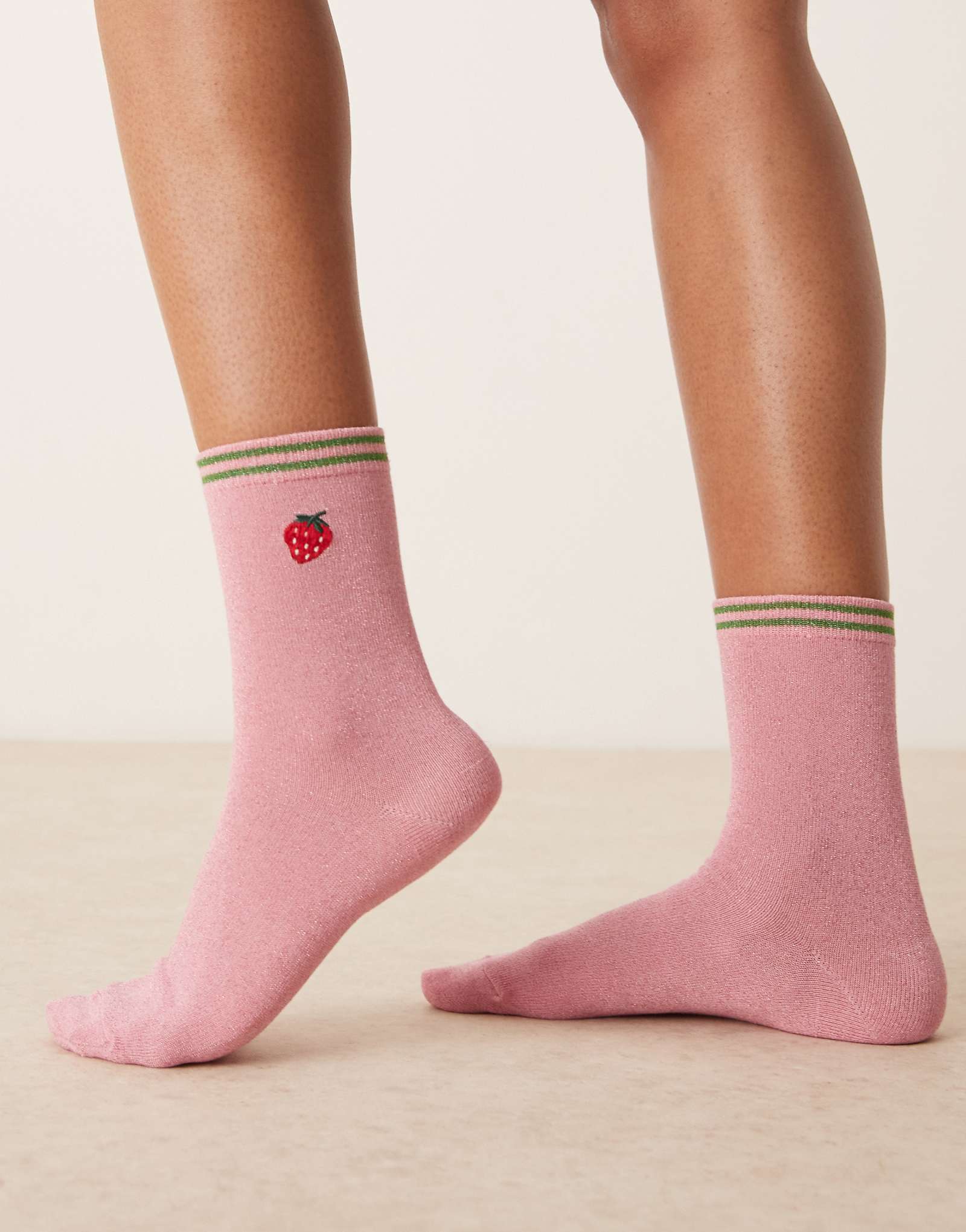 Accessorize varsity strawberry socks in pink