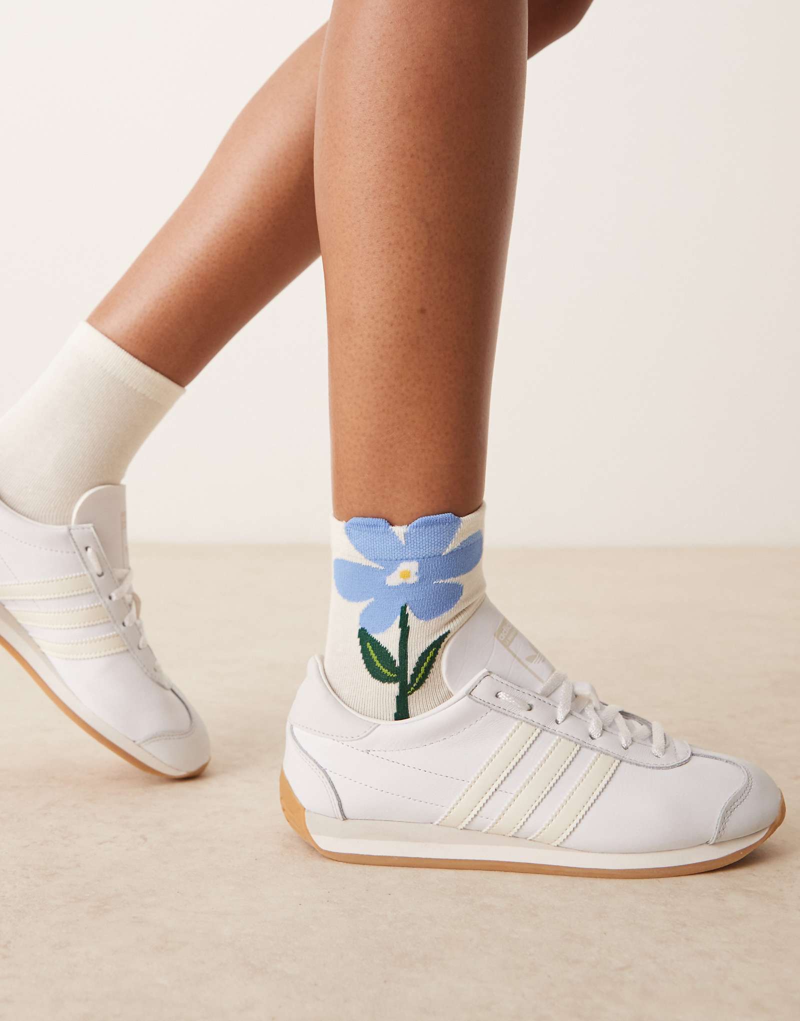 Accessorize 3D blue flower socks in cream