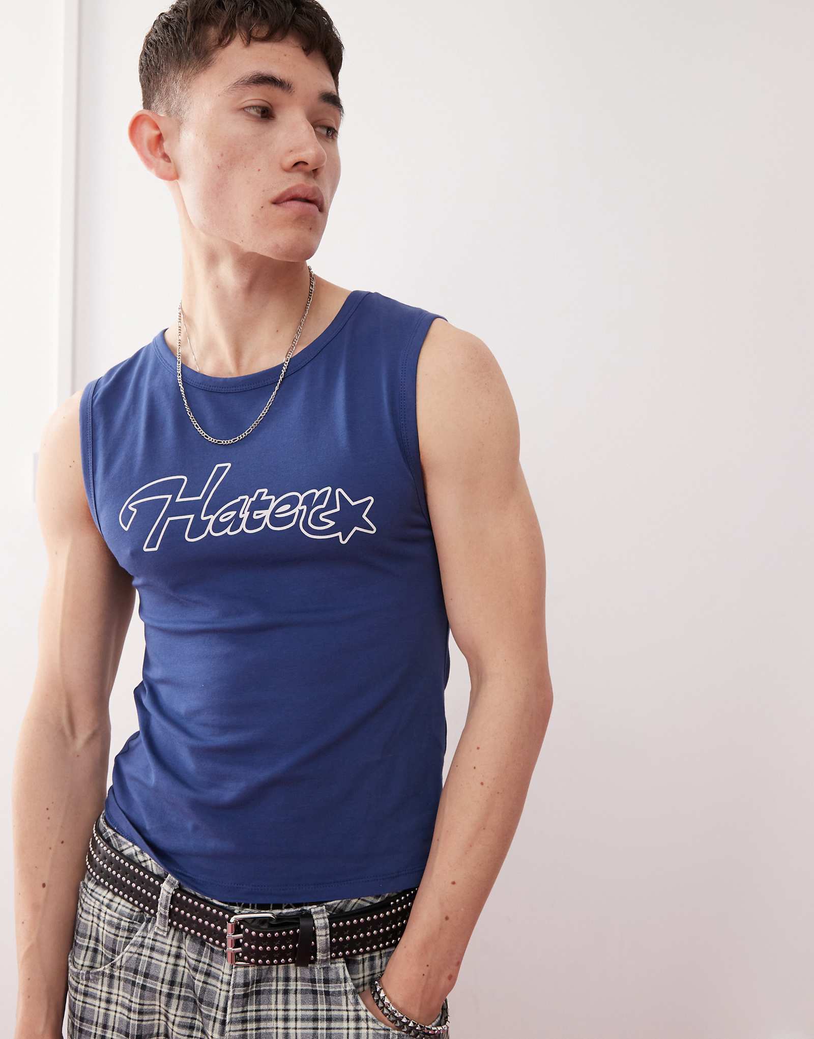 COLLUSION muscle fit tank top in navy blue with hater slogan