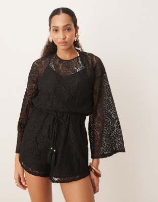 Вязаный крючком мини-комбинезон ASOS DESIGN с длинным рукавом и завязками черного цвета
