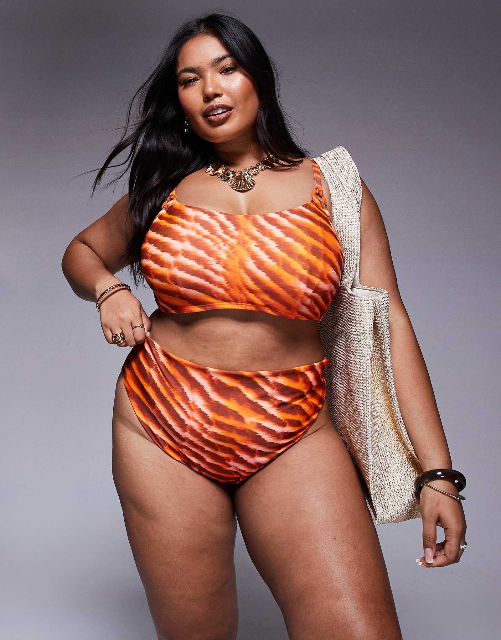 Купальники-бикини ASOS DESIGN Curve Charlie с завышенной талией и оранжевым животным принтом 2090₽