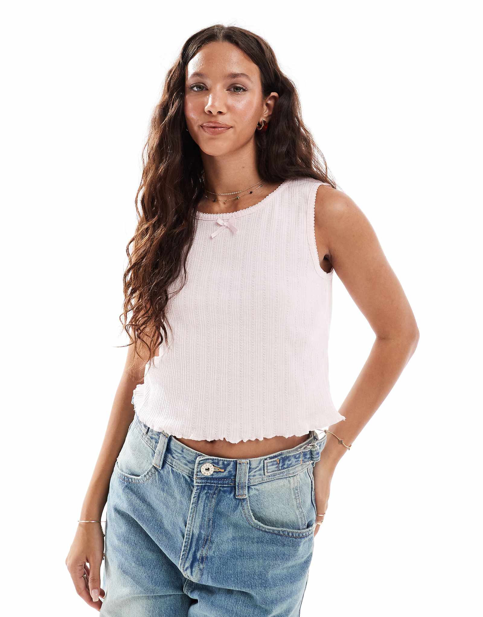 Укороченный топ-пуантель без рукавов с бантиком бледно-розового цвета 3690₽