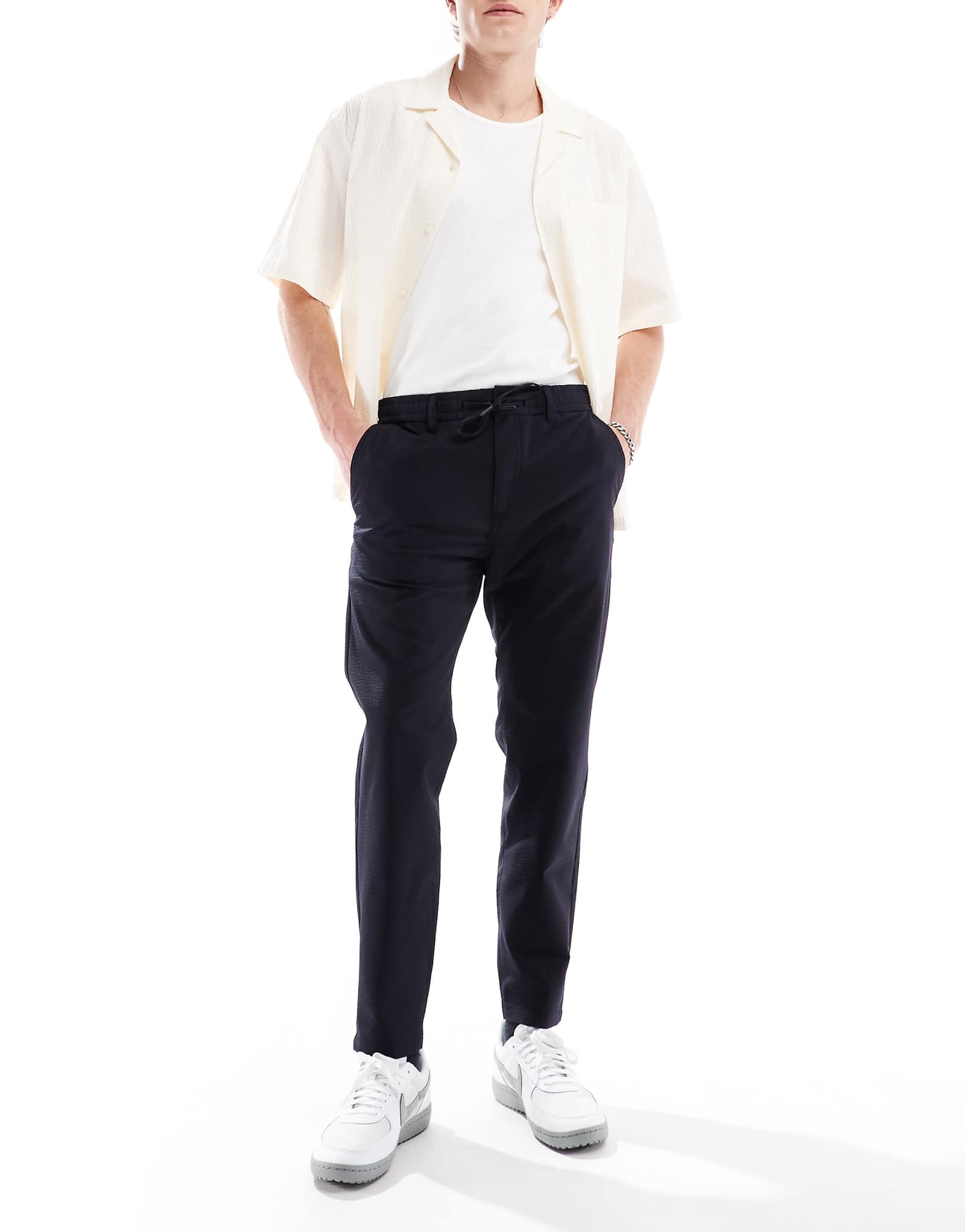 Темно-синие зауженные брюки-чино BOSS Orange с текстурированным шнурком 32290₽