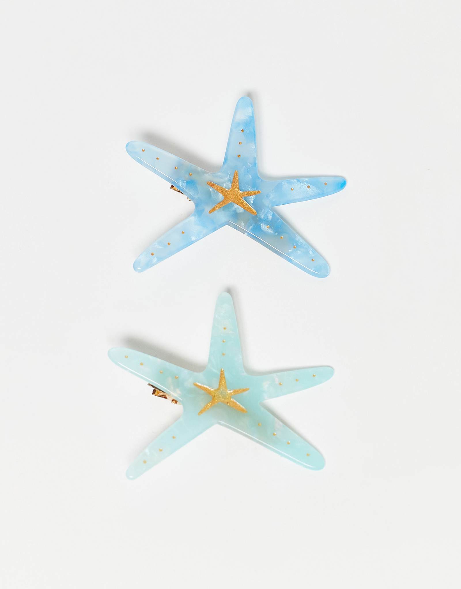 Заколки для волос в виде морских звезд бирюзового и синего цветов в упаковке по 2 штуки 2590₽