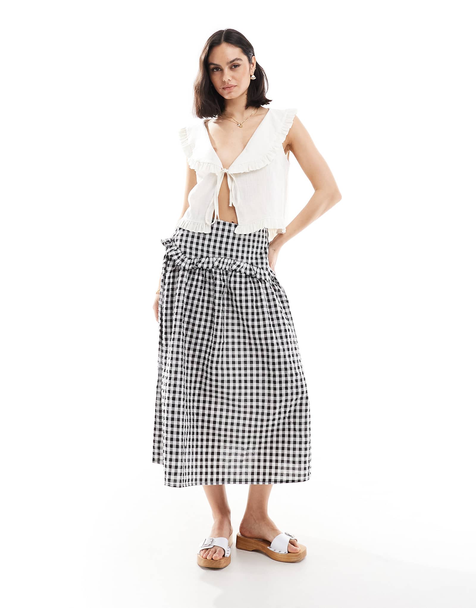 Юбка миди в клетку с рюшами для девочек в среду черного цвета 11390₽