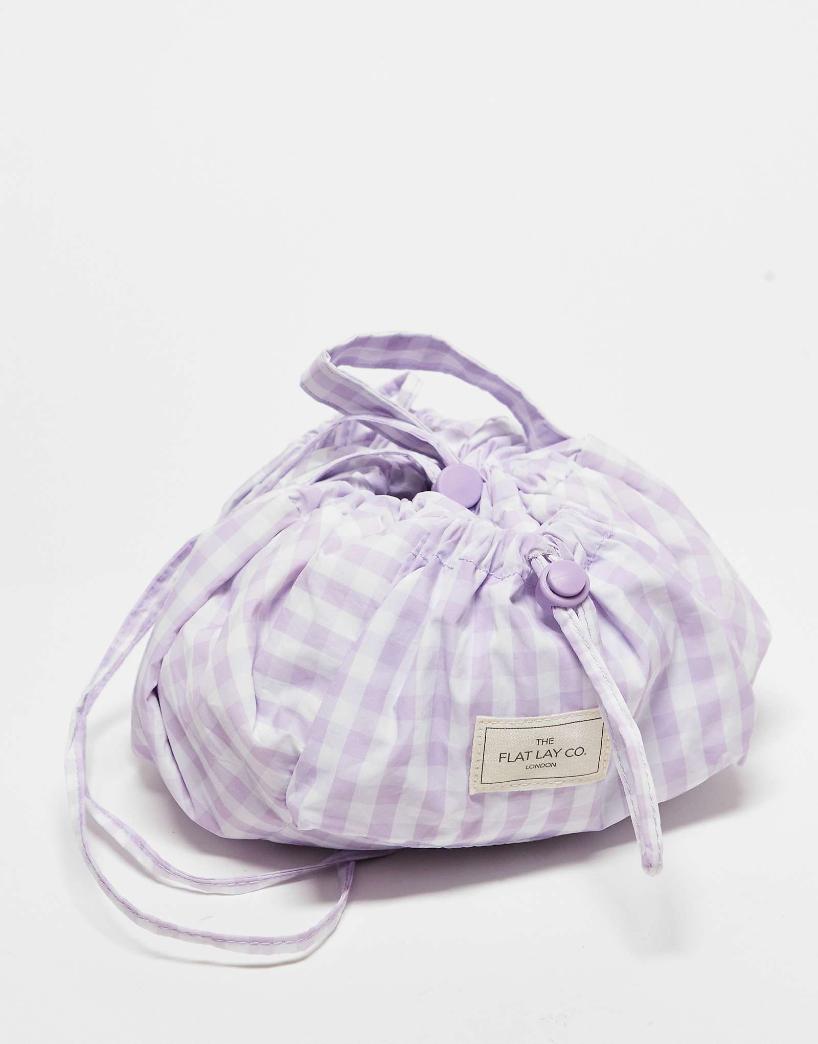 Эксклюзивная косметичка на шнурке от ASOS Flat Lay Co. x в сиреневую полоску