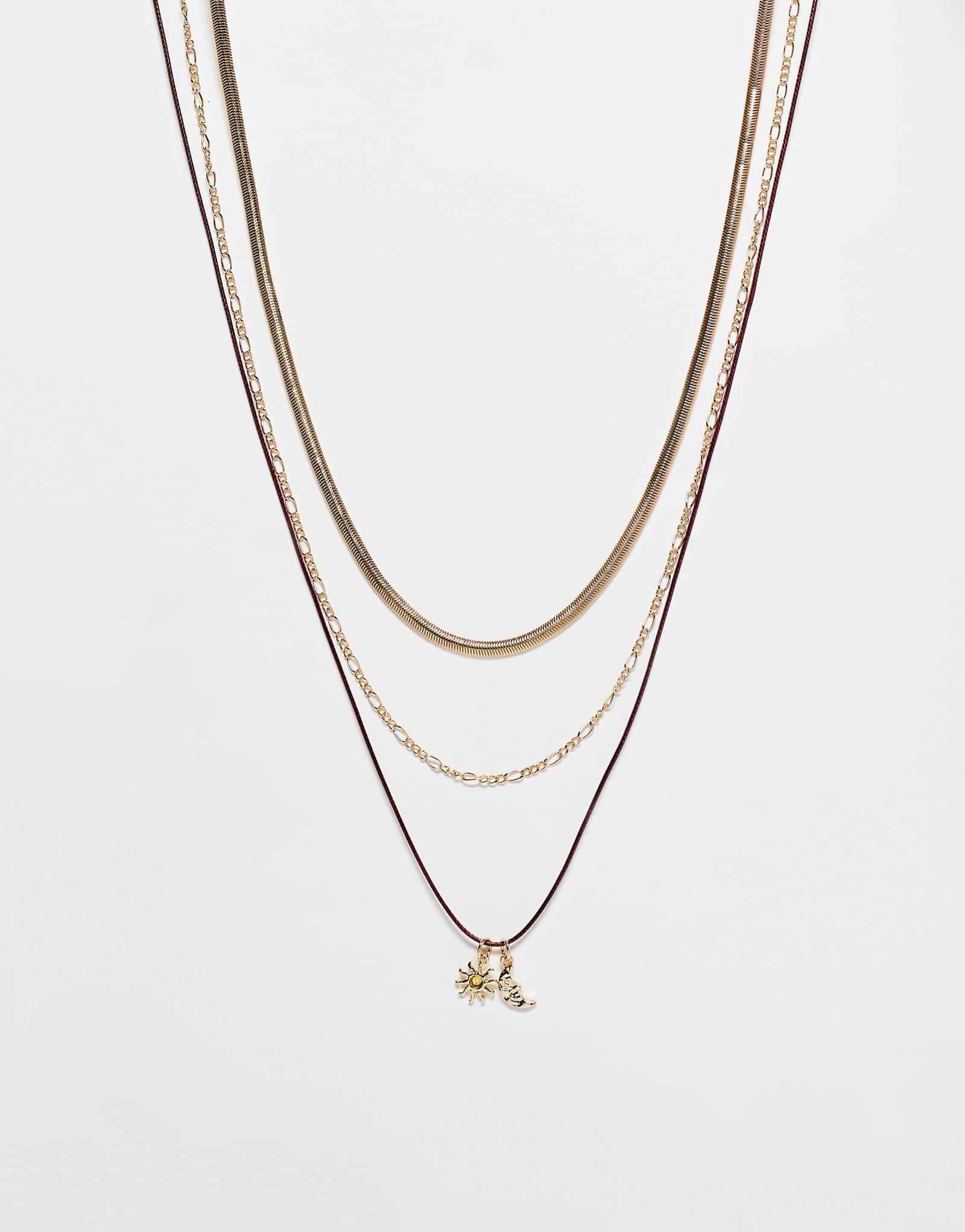Многослойные ожерелья ASOS DESIGN Curve из шнура и цепочки в сочетании с золотистыми небесными подвесками - часть набора