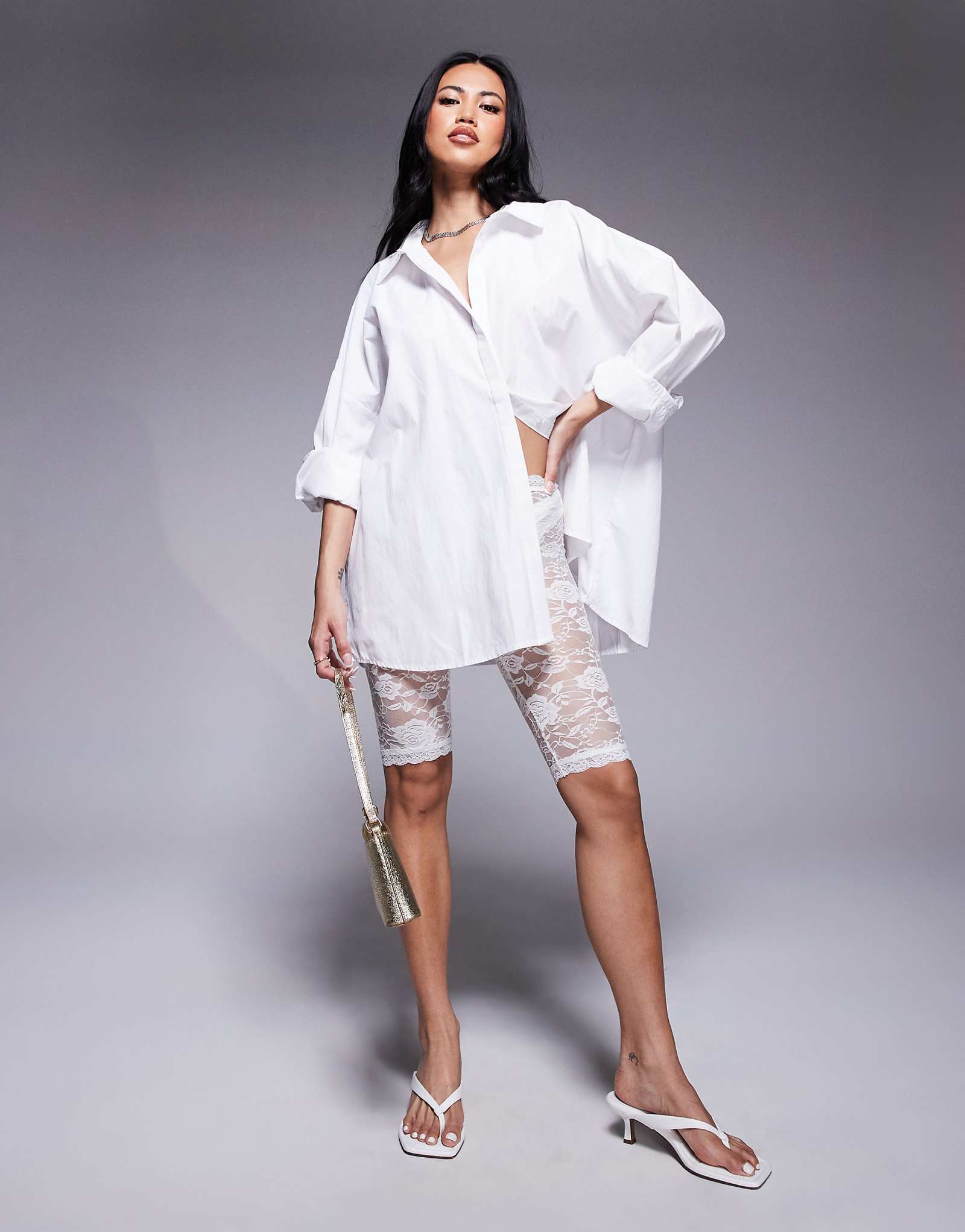 Короткое кружевное платье River Island белого цвета 6090₽