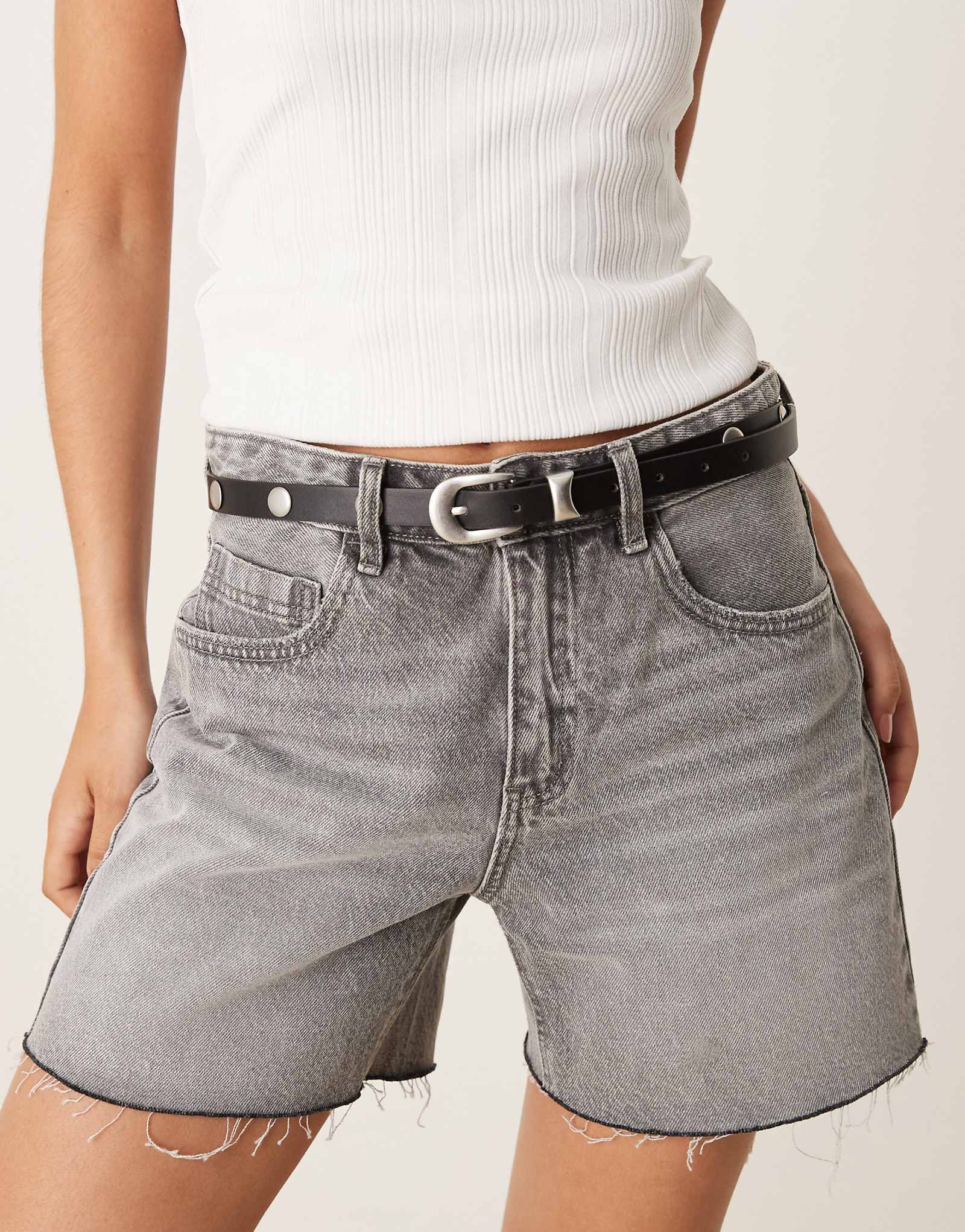 Пояс в западном стиле из трикотажа Gina с заклепками и серебряной пряжкой черного цвета