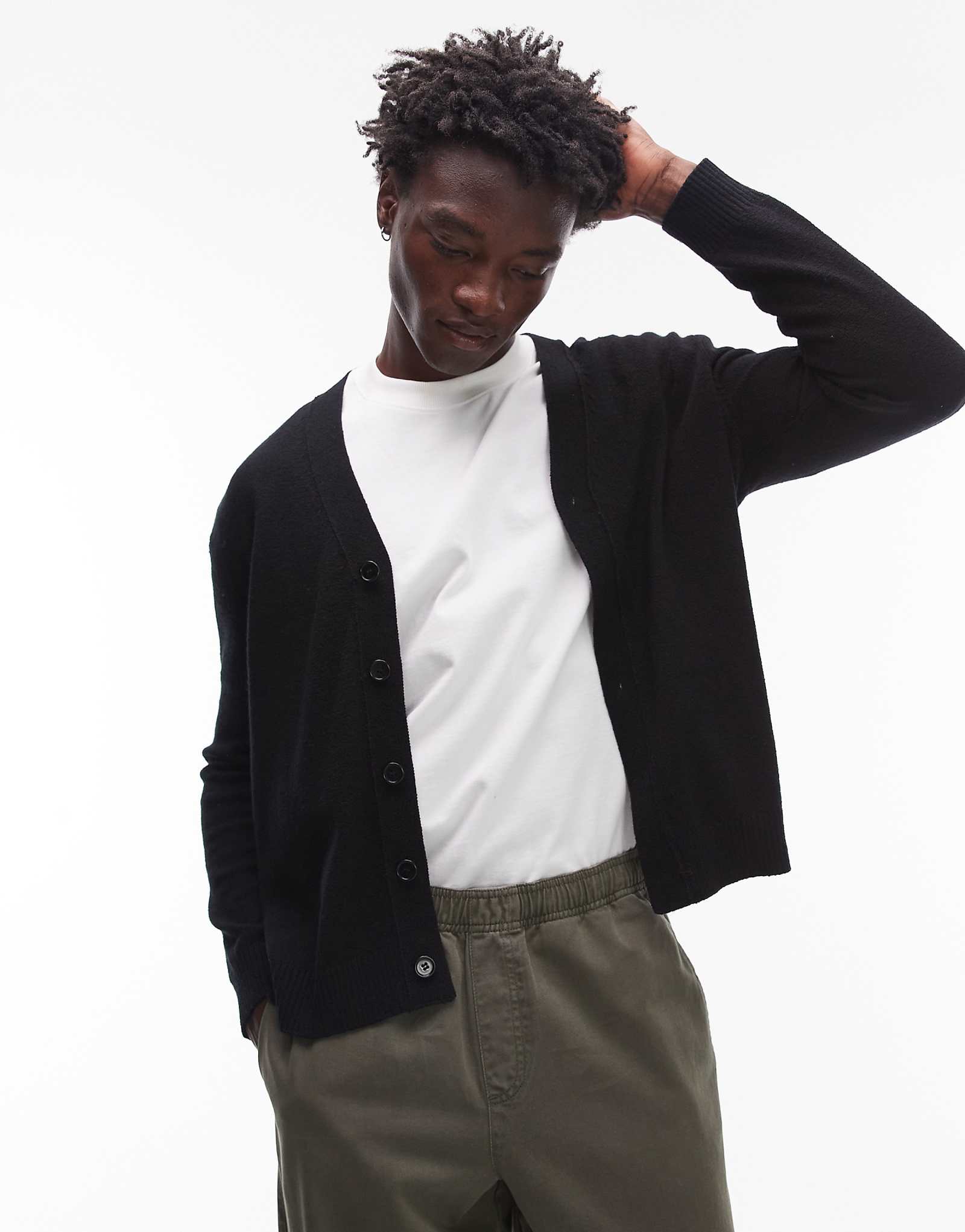 Вязаный кардиган из фактурной смеси шерсти ARKET черного цвета 28190₽