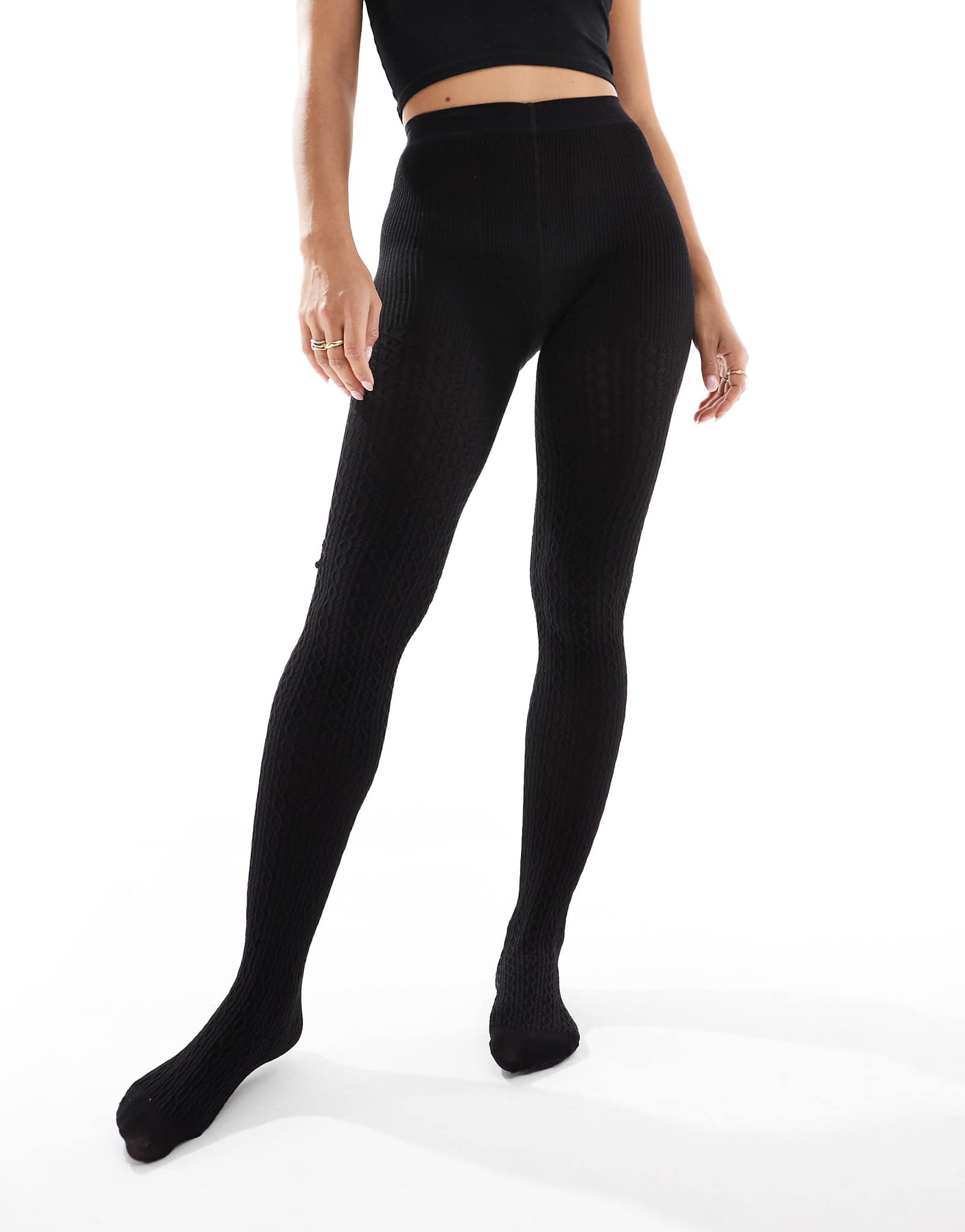 Плотная вязка из тонкого троса Lindex черного цвета 2090₽