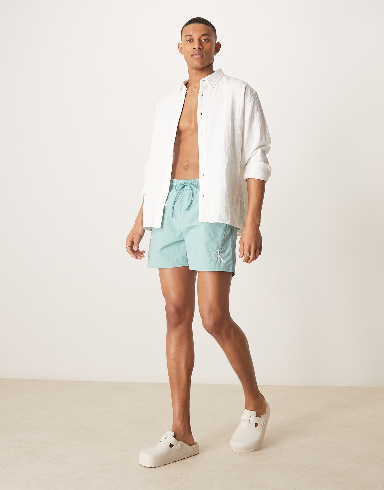 Плавательные шорты с логотипом Calvin Klein на завязках цвета морской волны 9090₽