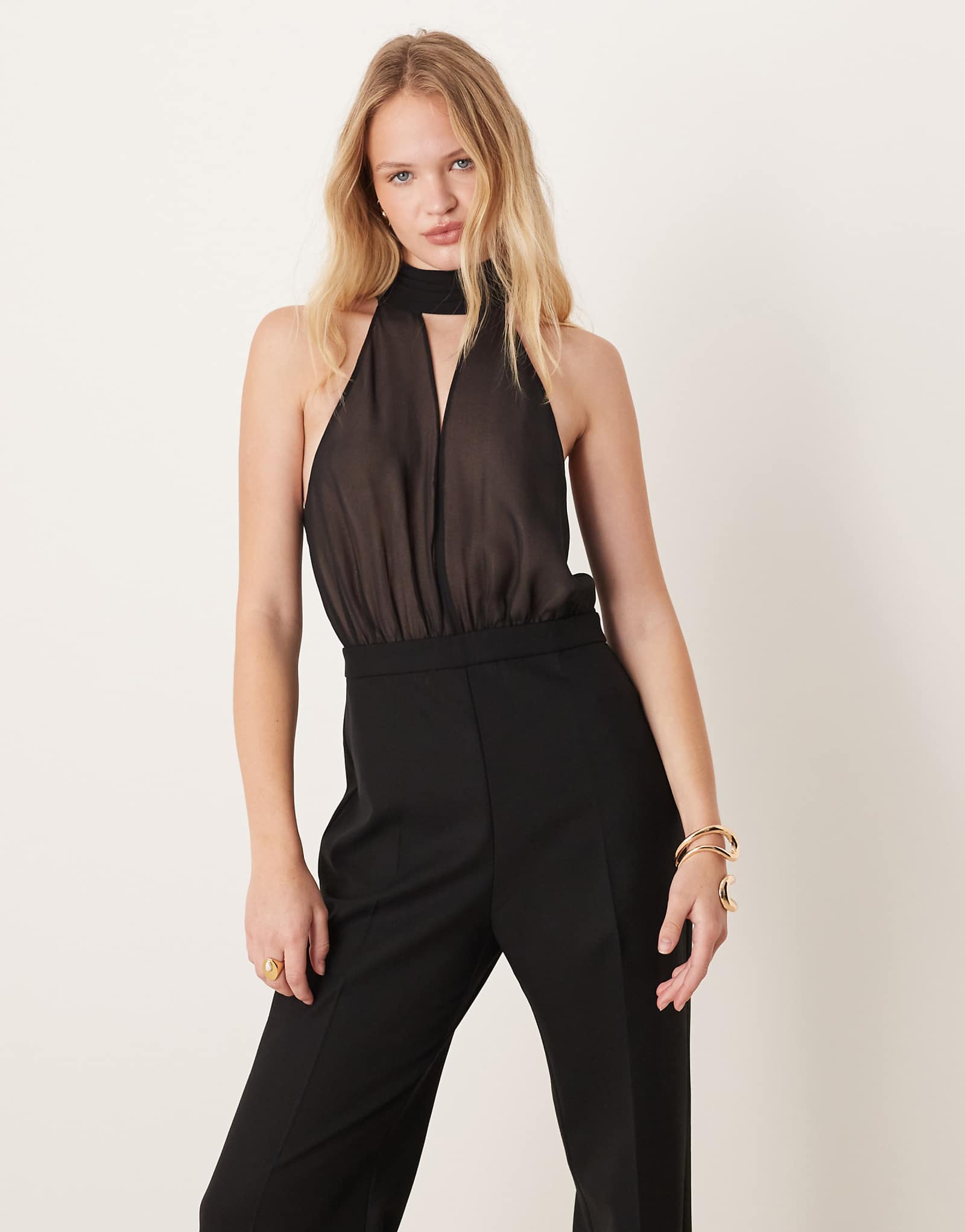 Прозрачный комбинезон Mango с высоким вырезом горловины черного цвета 32590₽