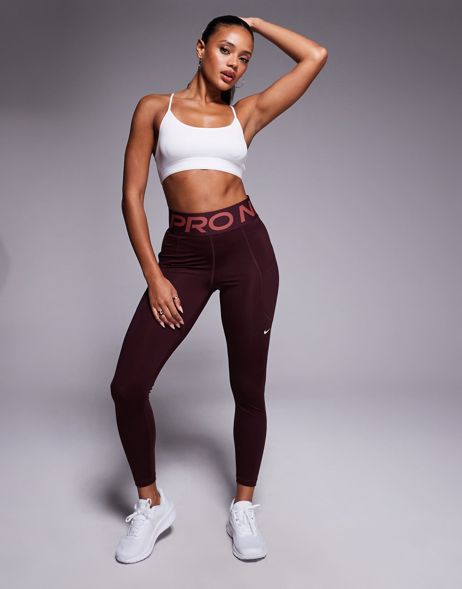 Леггинсы Nike Pro Training Dri-FIT sculpt 78 бордового цвета 12290₽