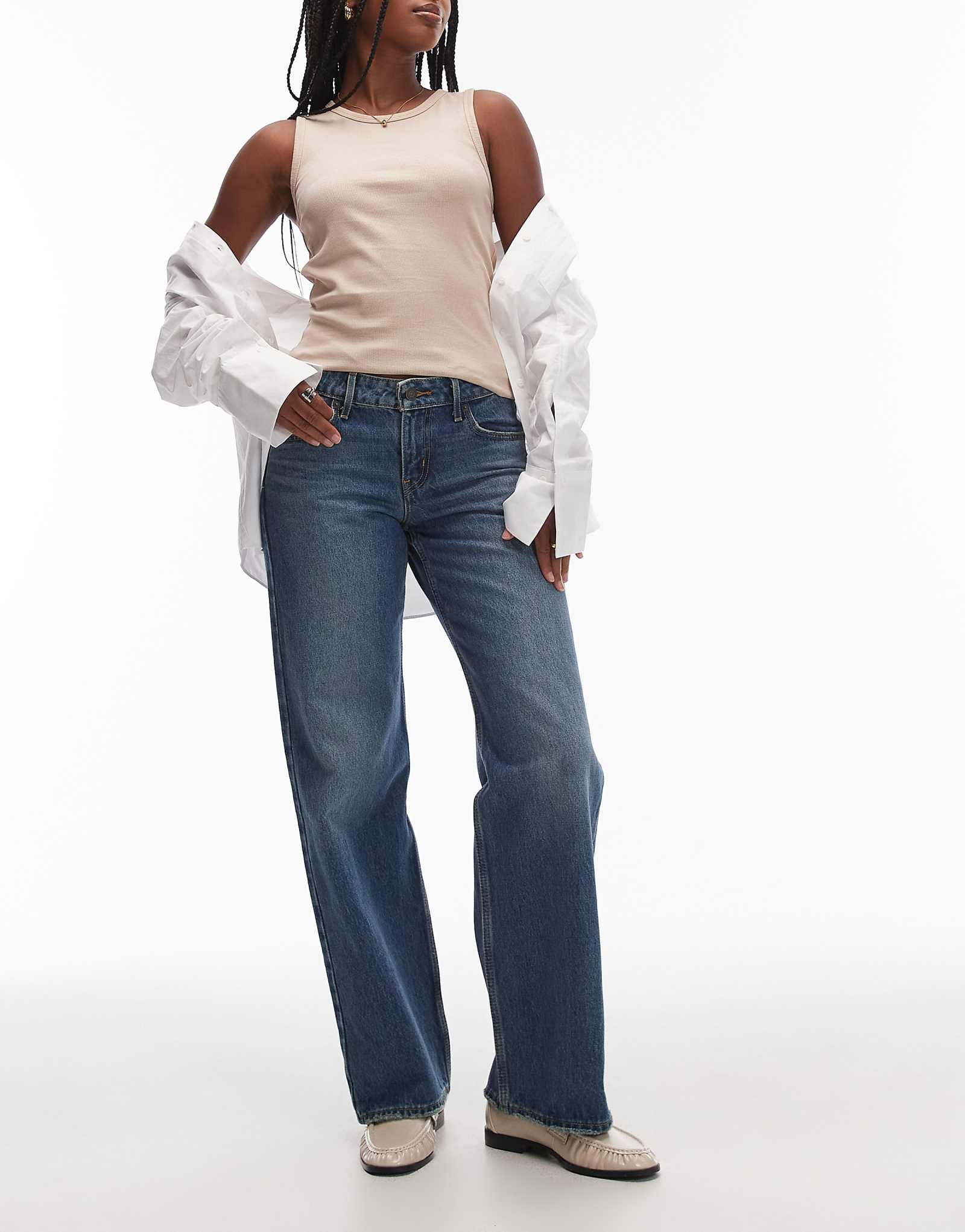 Джинсы Levis с низкими свободными прямыми штанинами темно-синего цвета 35490₽