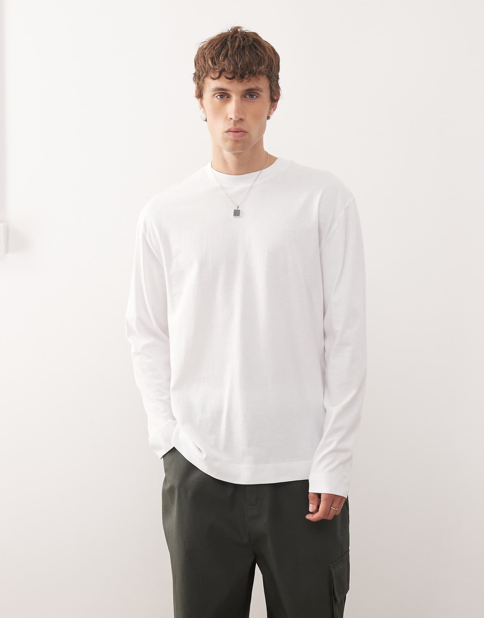 Белая футболка с длинным рукавом COLLUSION 3490₽