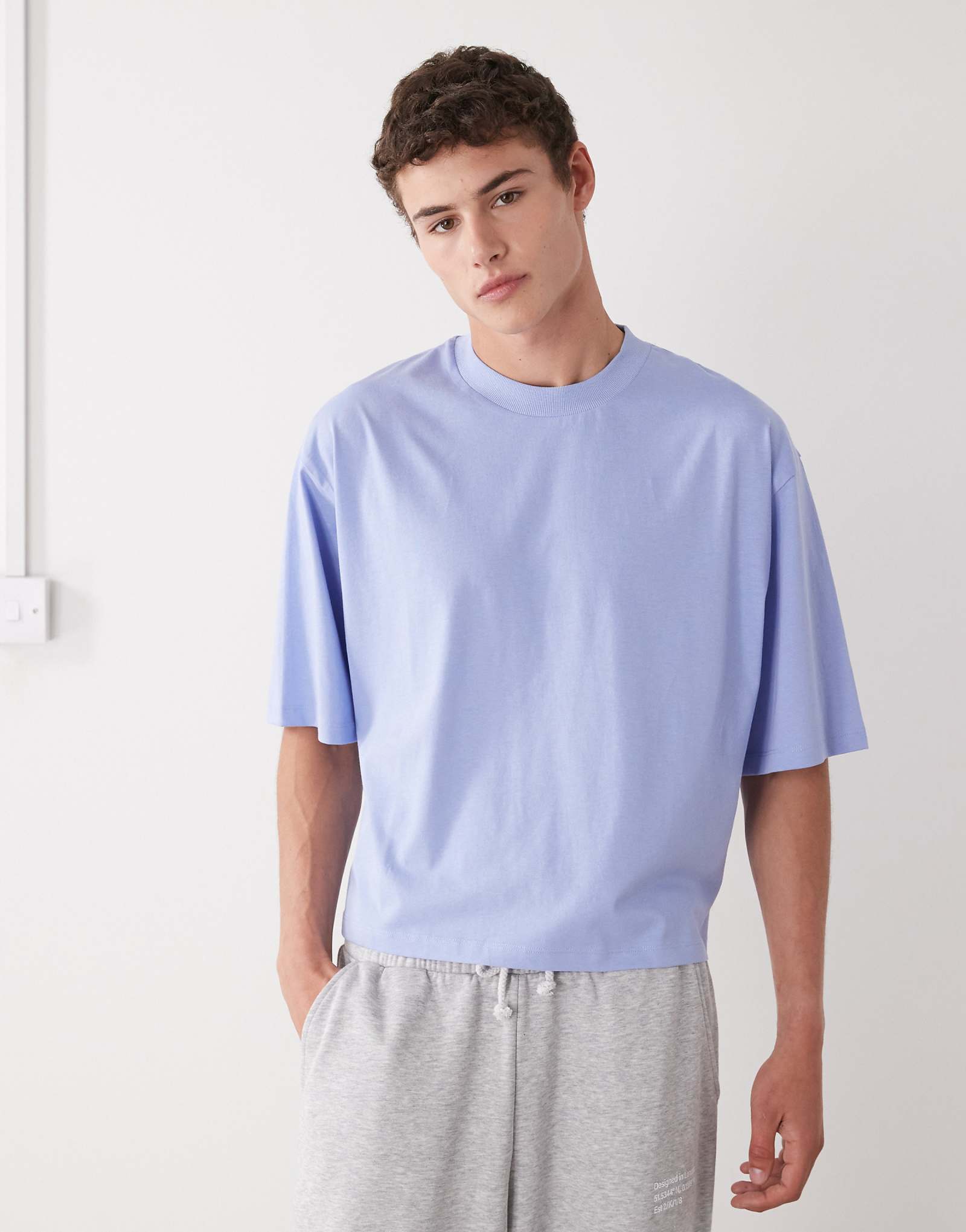 Облегающая футболка COLLUSION светло-голубого цвета 2590₽