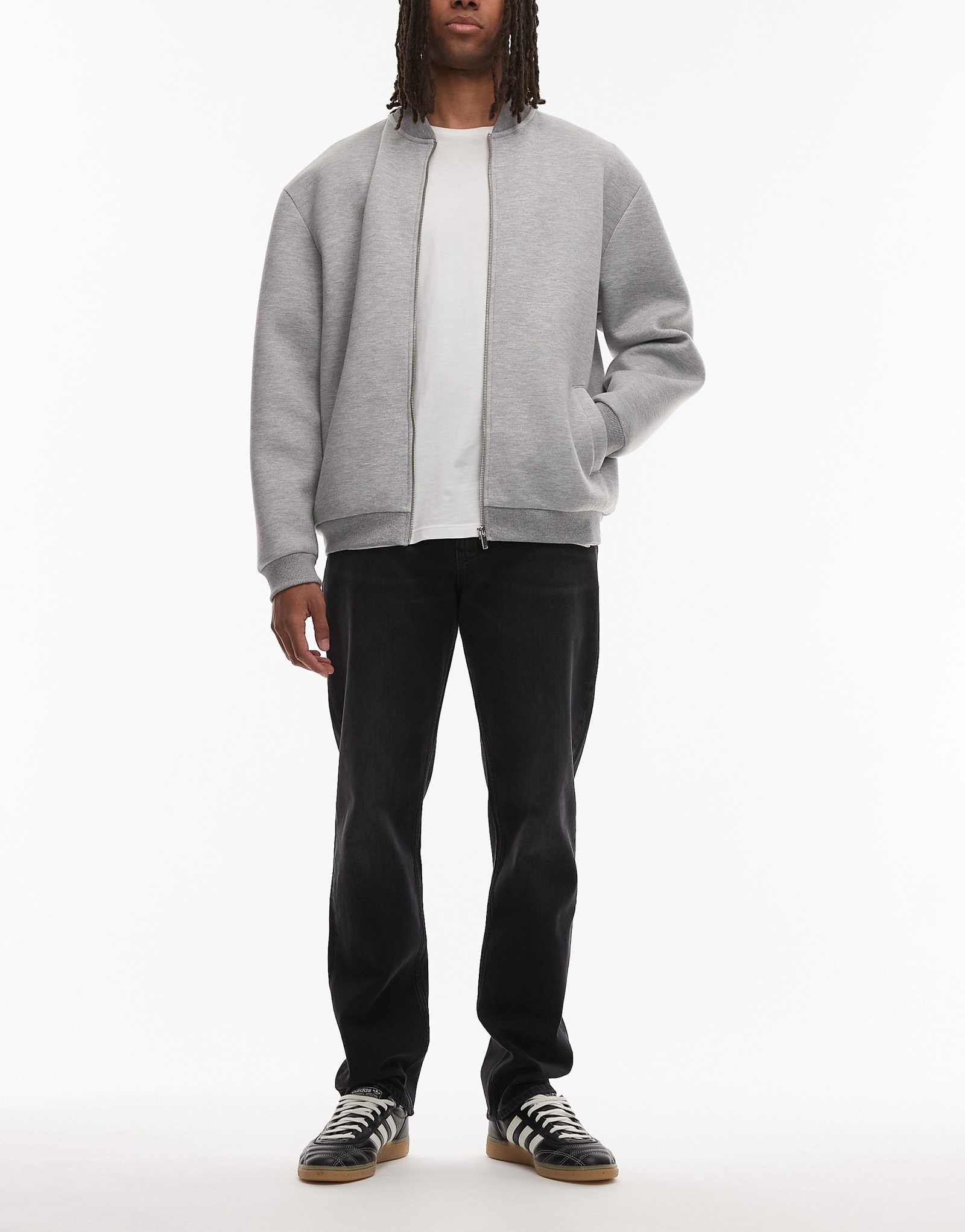 Узкие прямые джинсы Tommy Jeans Ryan черного цвета после стирки 22390₽