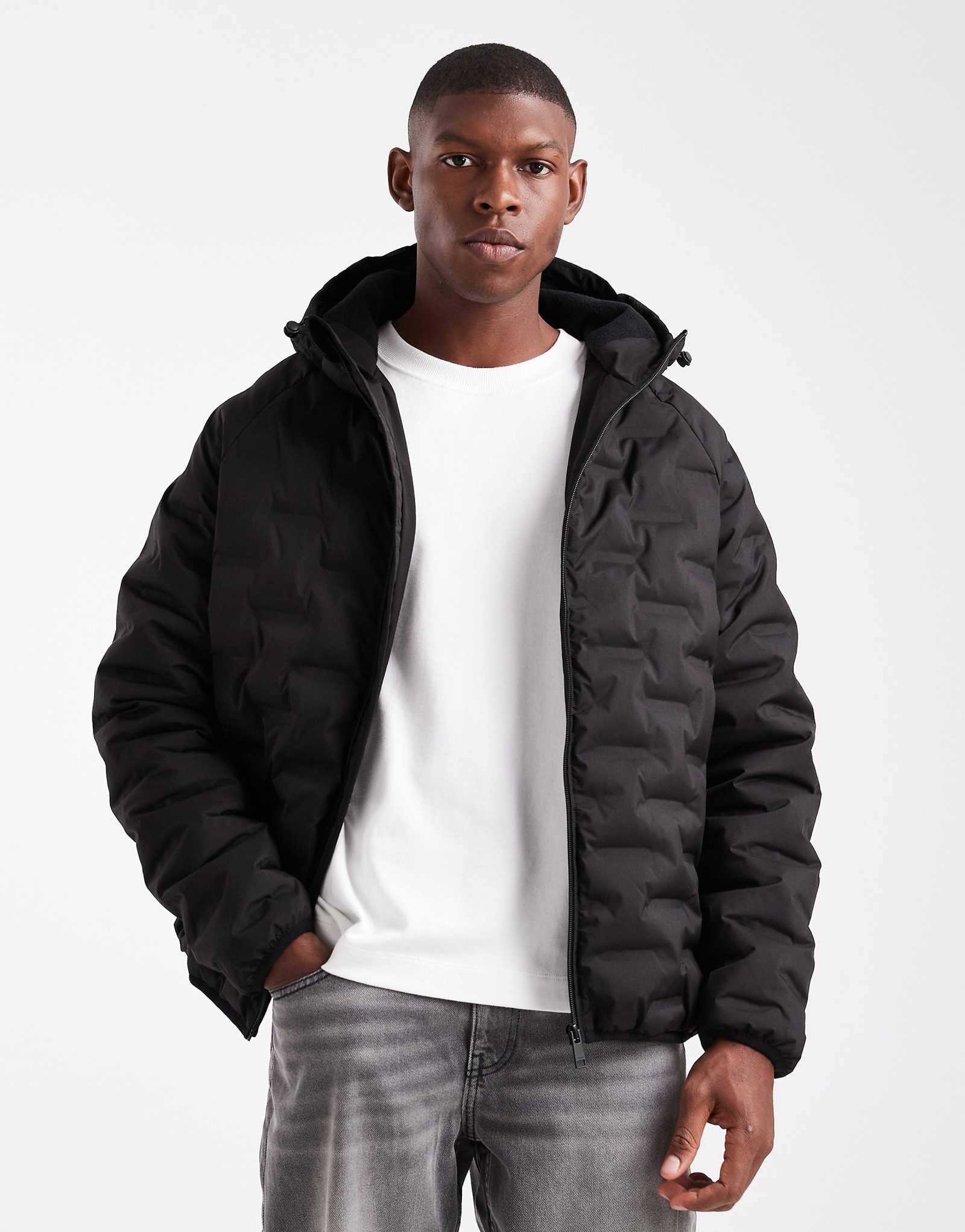 Поношенное текстурированное пуховое пальто с капюшоном черного цвета 12890₽