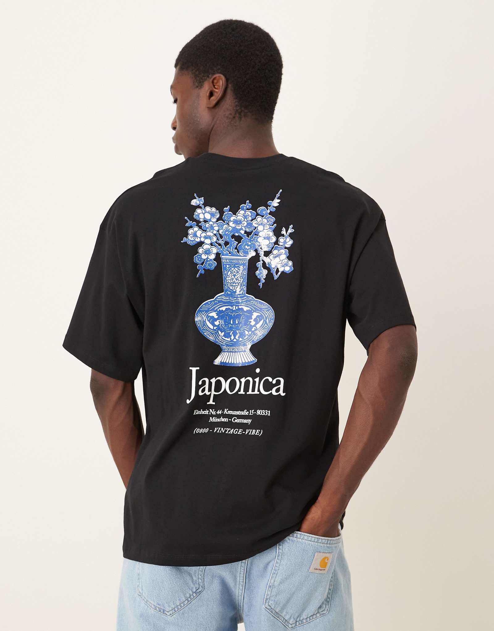 Выбранная футболка оверсайз черного цвета с принтом 