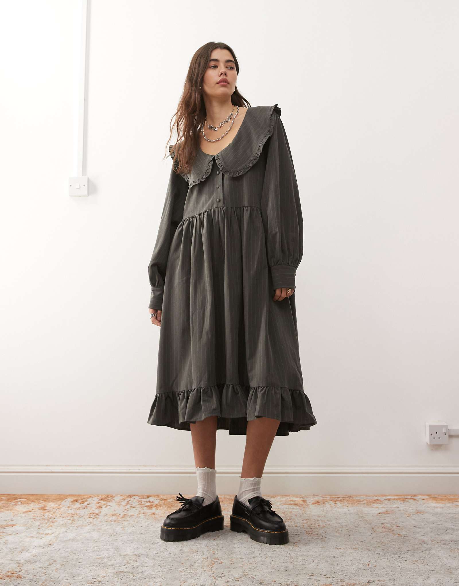 - The Ragged Priest curio    gray pinstripe