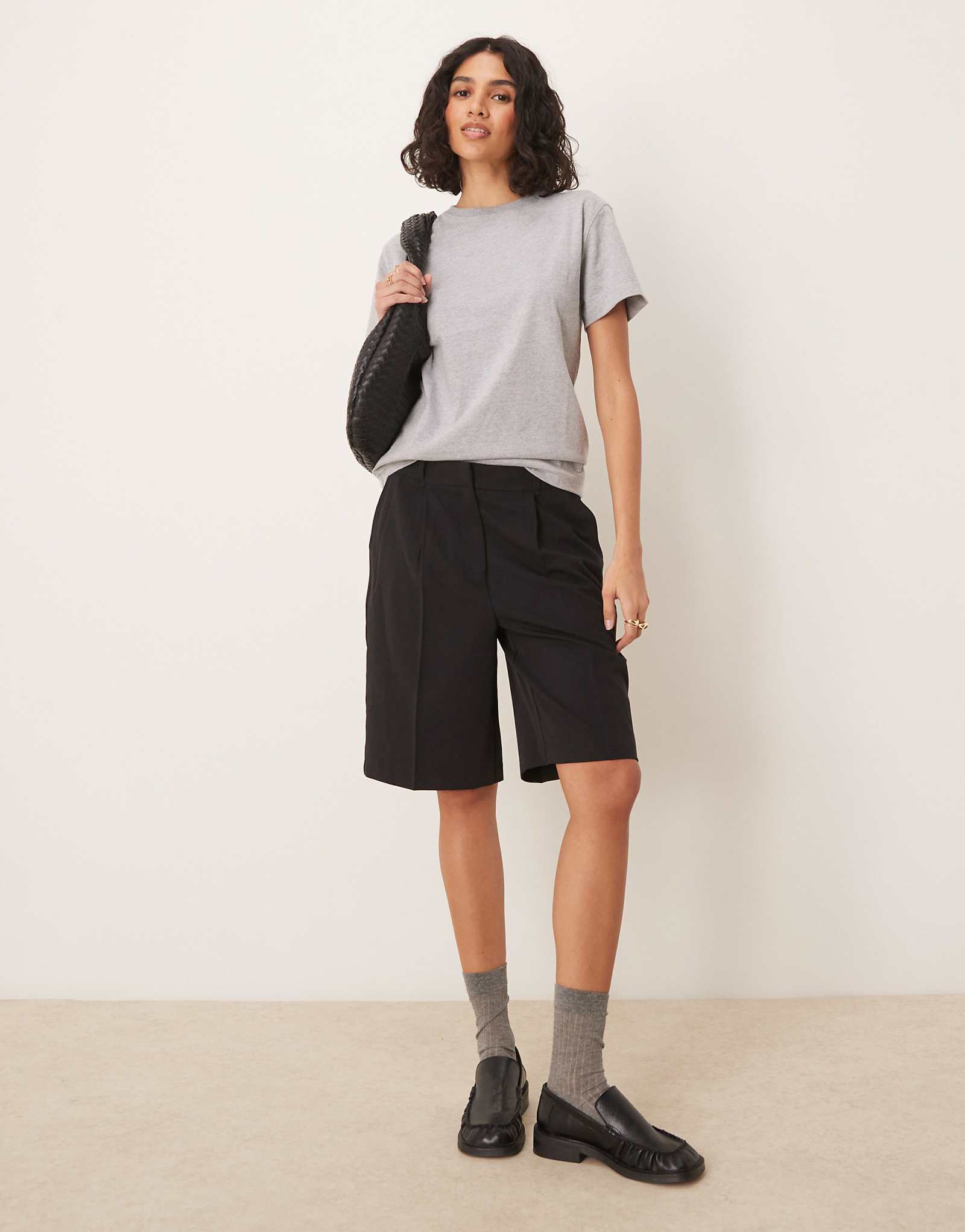 AWARE pleat front tailored shorts in black 13990₽