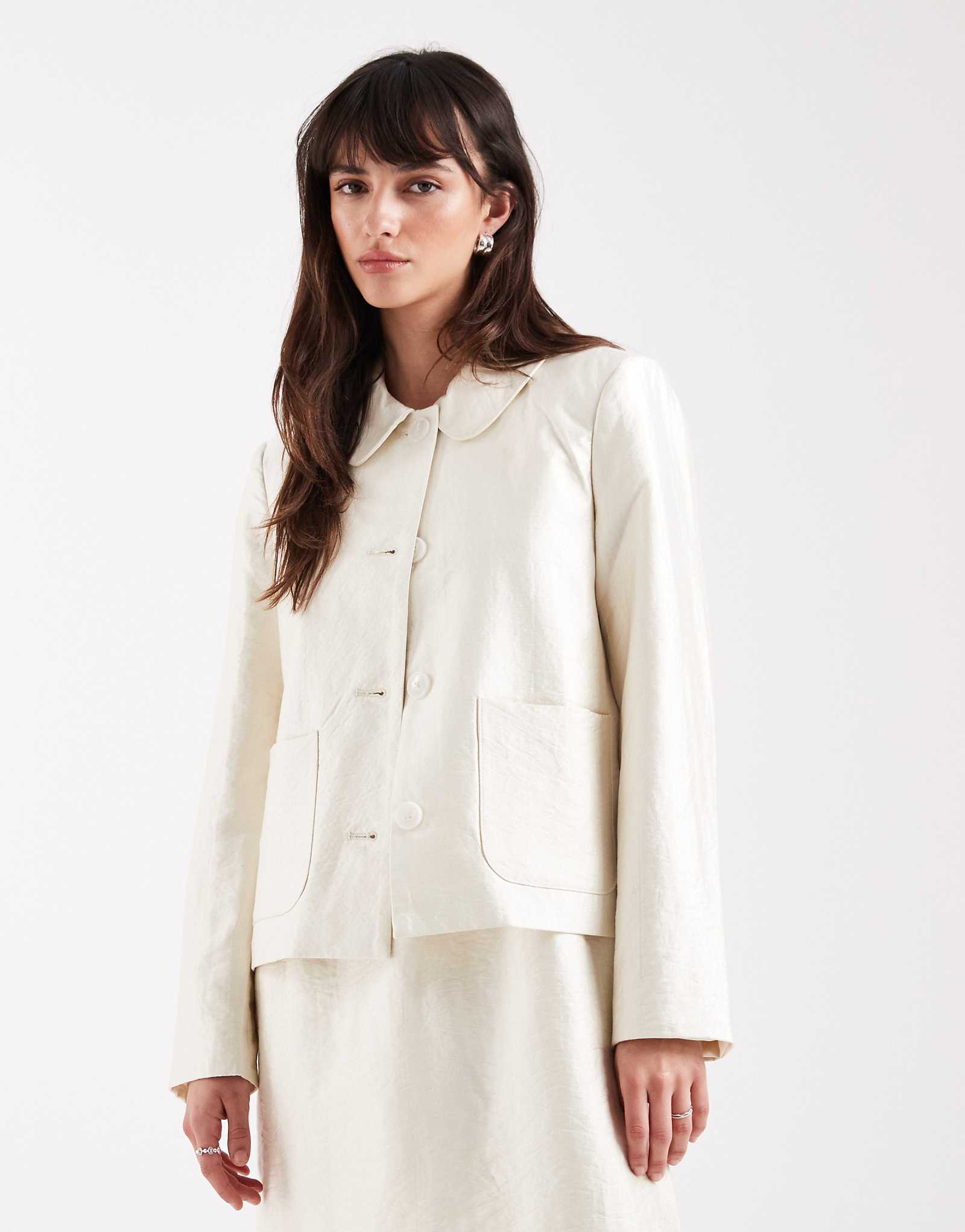 AWARE pocketed front short jacket in white shimmer - part of a set bone white