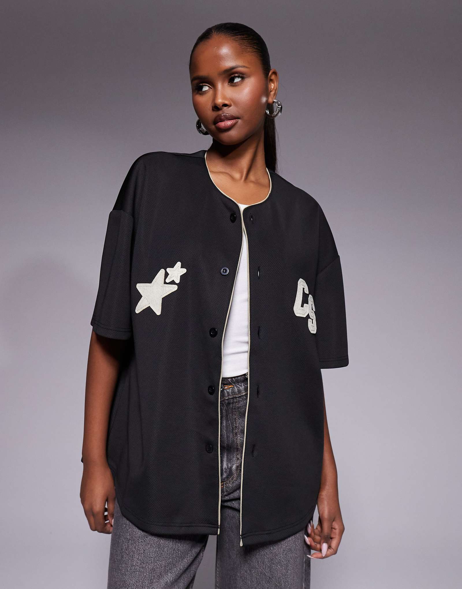 Courtside boxy baseball jersey in black with beige appliqus black
