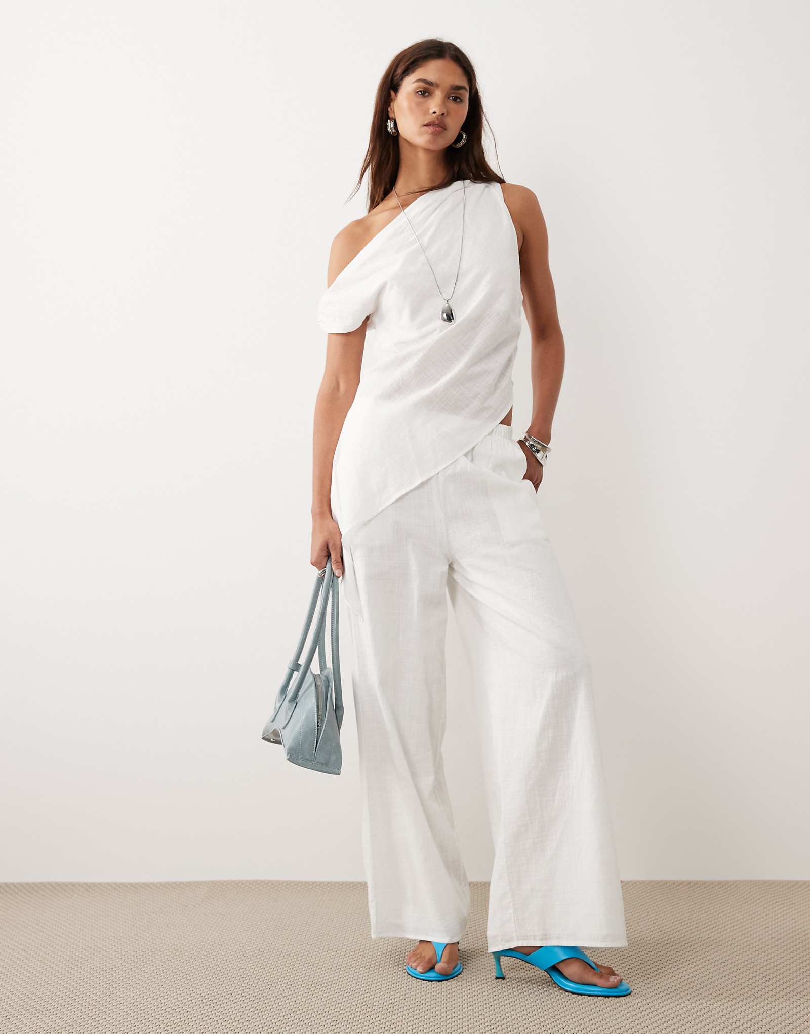 BRONZE SNAKE Tasi off the shoulder asymmetric top and pants set in white white