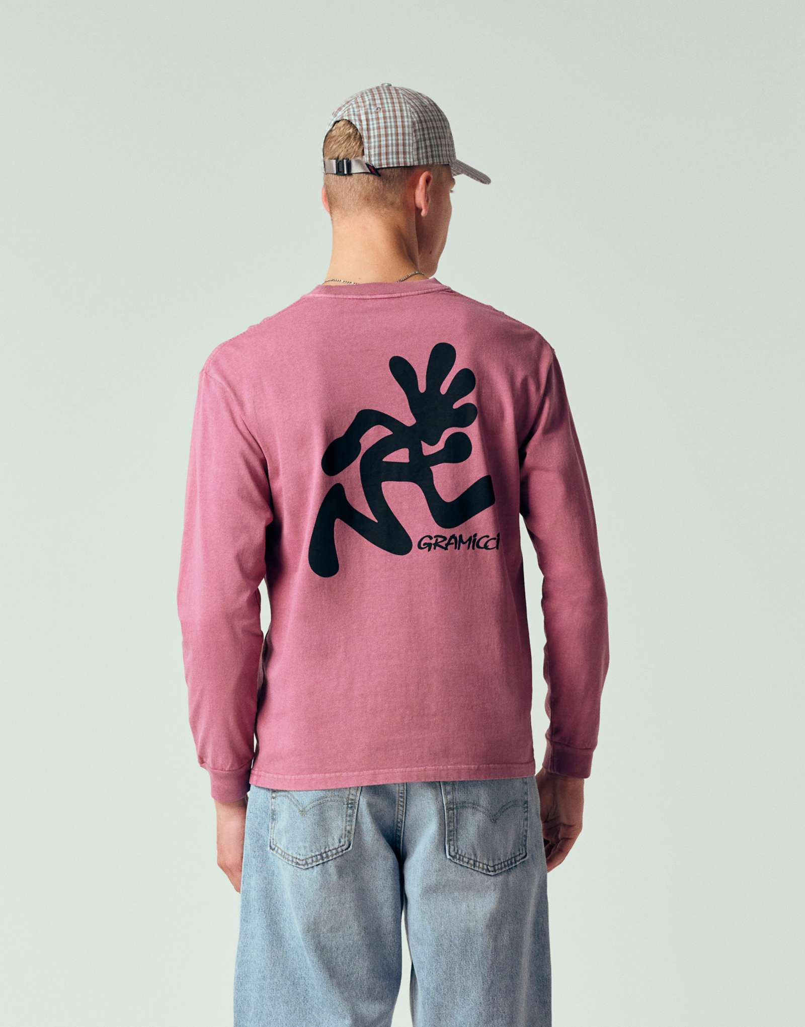 Gramicci running man long sleeve pigment dyed tee with back and chest graphic in red pigment washed red 16890₽