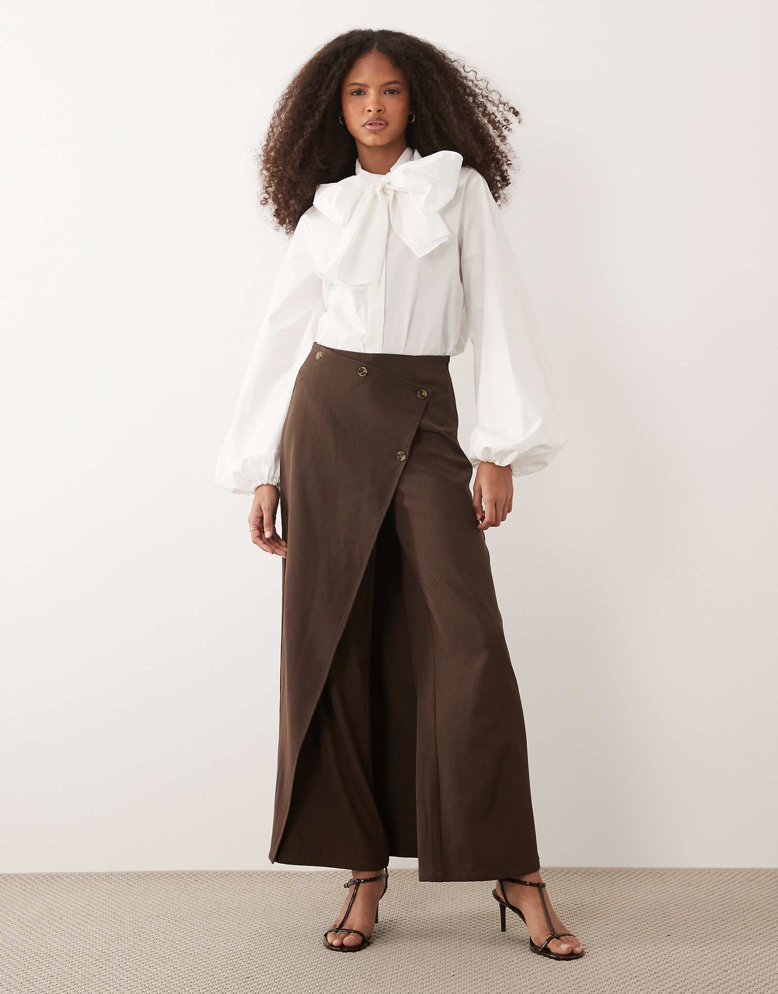 IYAL pants with wrap over skirt button detail in brown brown