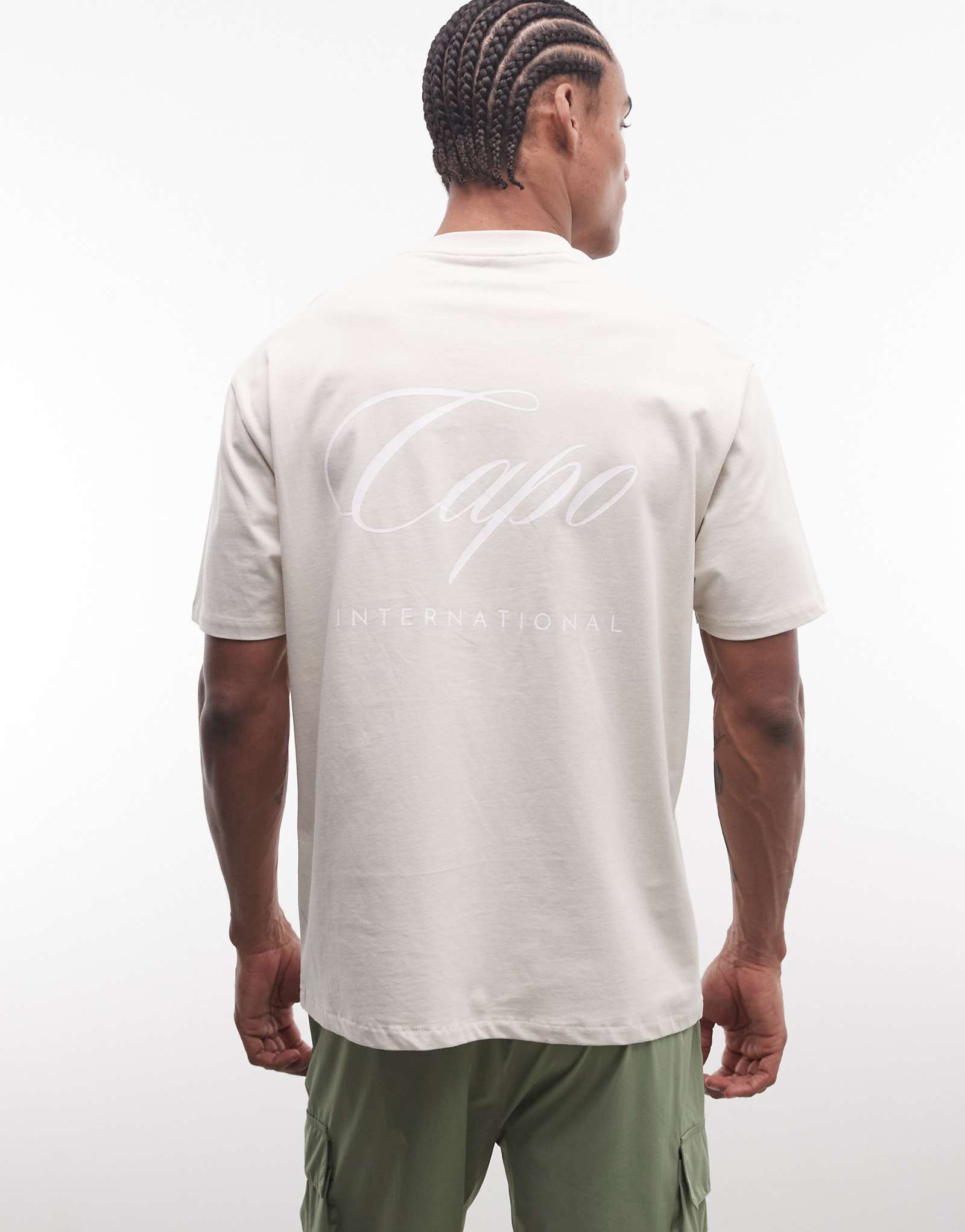 CAPO international logo back print T-shirt in beige beige 9290₽