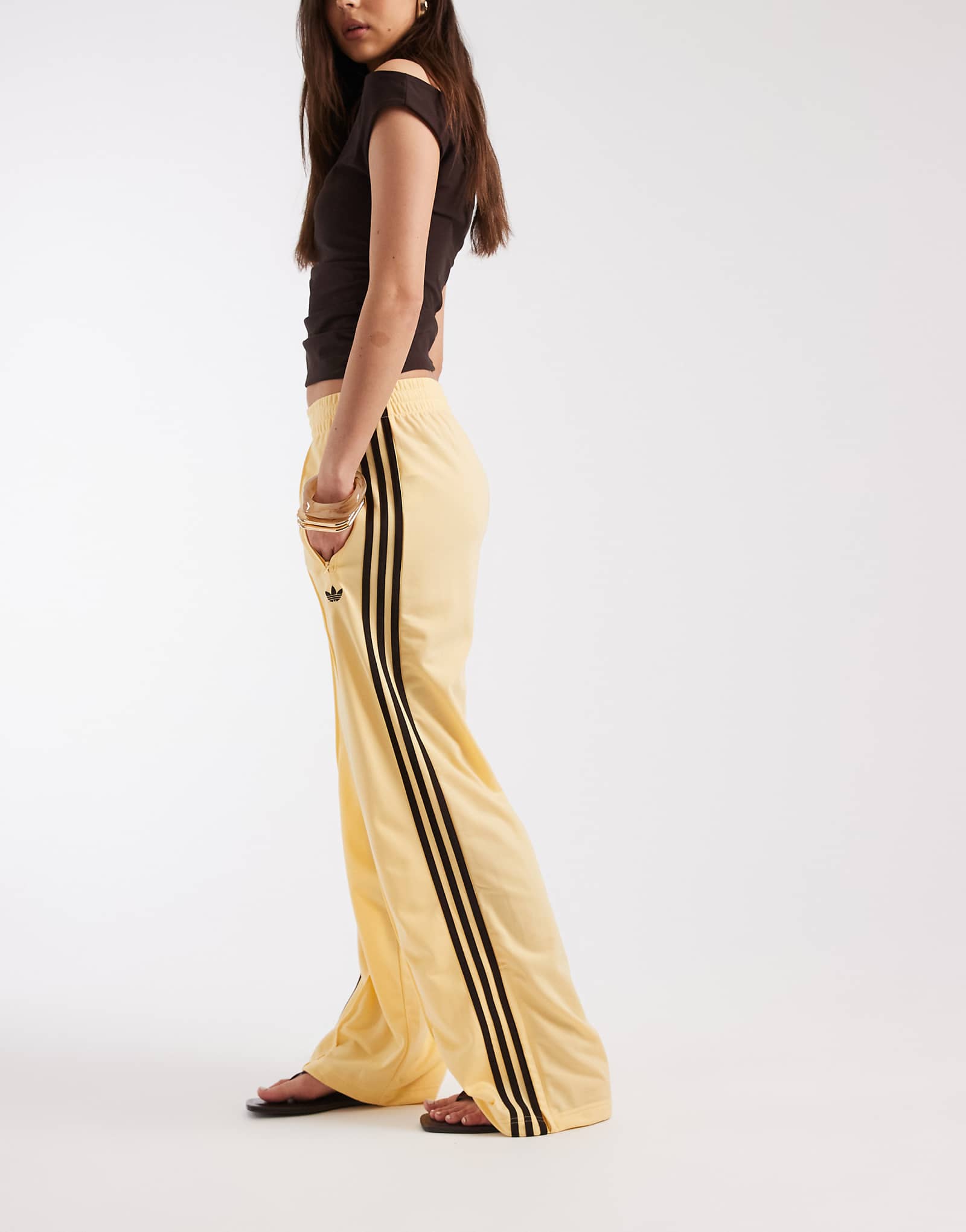 Adidas Originals Firebird track pants in yellow and brown yellow 14490₽