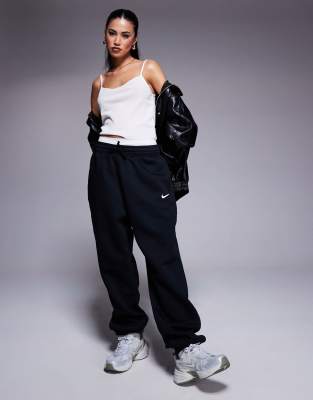 Спортивные брюки Nike Mini Swoosh черного цвета 