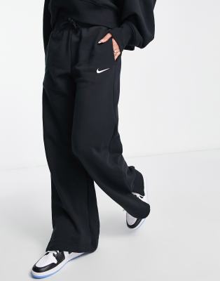 Спортивные брюки с высокой посадкой и широкими штанинами из флиса Nike Phoenix черного цвета
