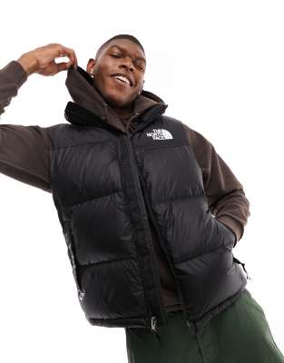 Черный пуховый жилет The North Face
