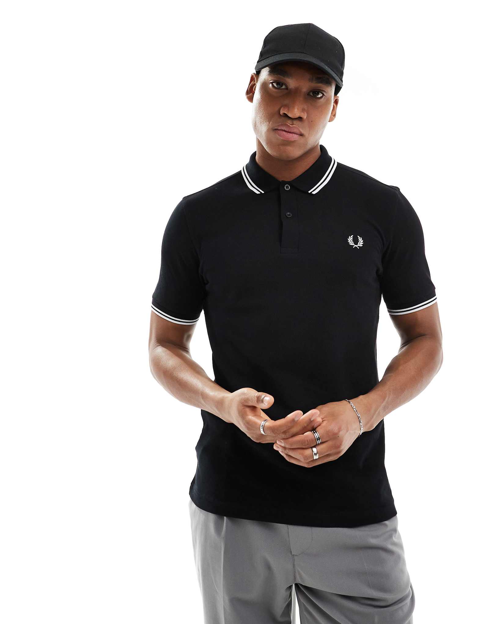 Поло с двумя логотипами Fred Perry черного цвета 27590₽