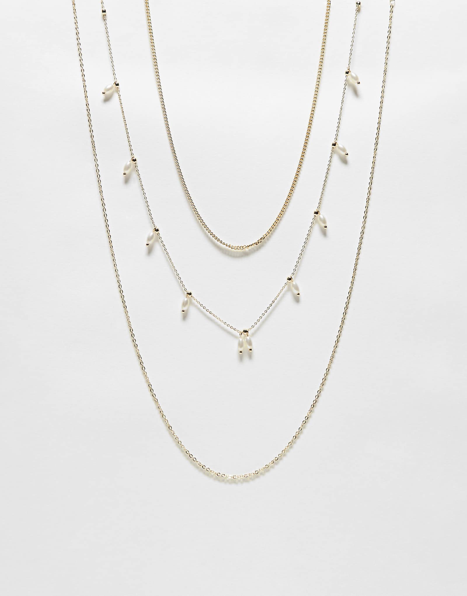 Комплект из 3-х ярусных ожерелий Pieces Curve с отделкой из искусственного жемчуга в золоте 5690₽